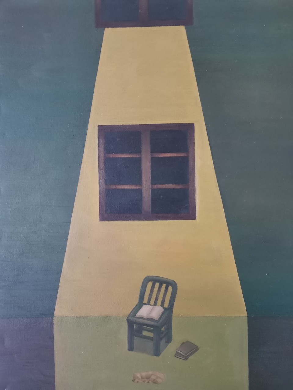 A surreal painting of a yellow house with two windows, a chair, and a book on a green background.
