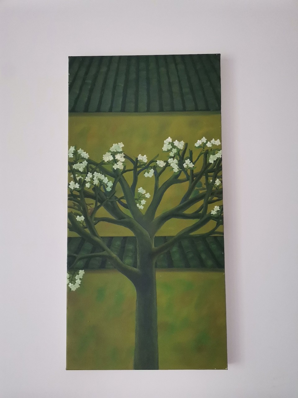 A vertical painting of a blossoming tree against a layered background of green and yellow tones.