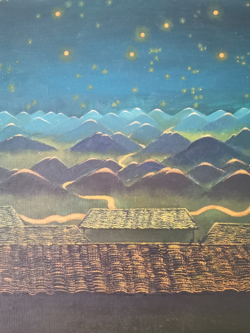 A painting hanging on a wall in a room.
