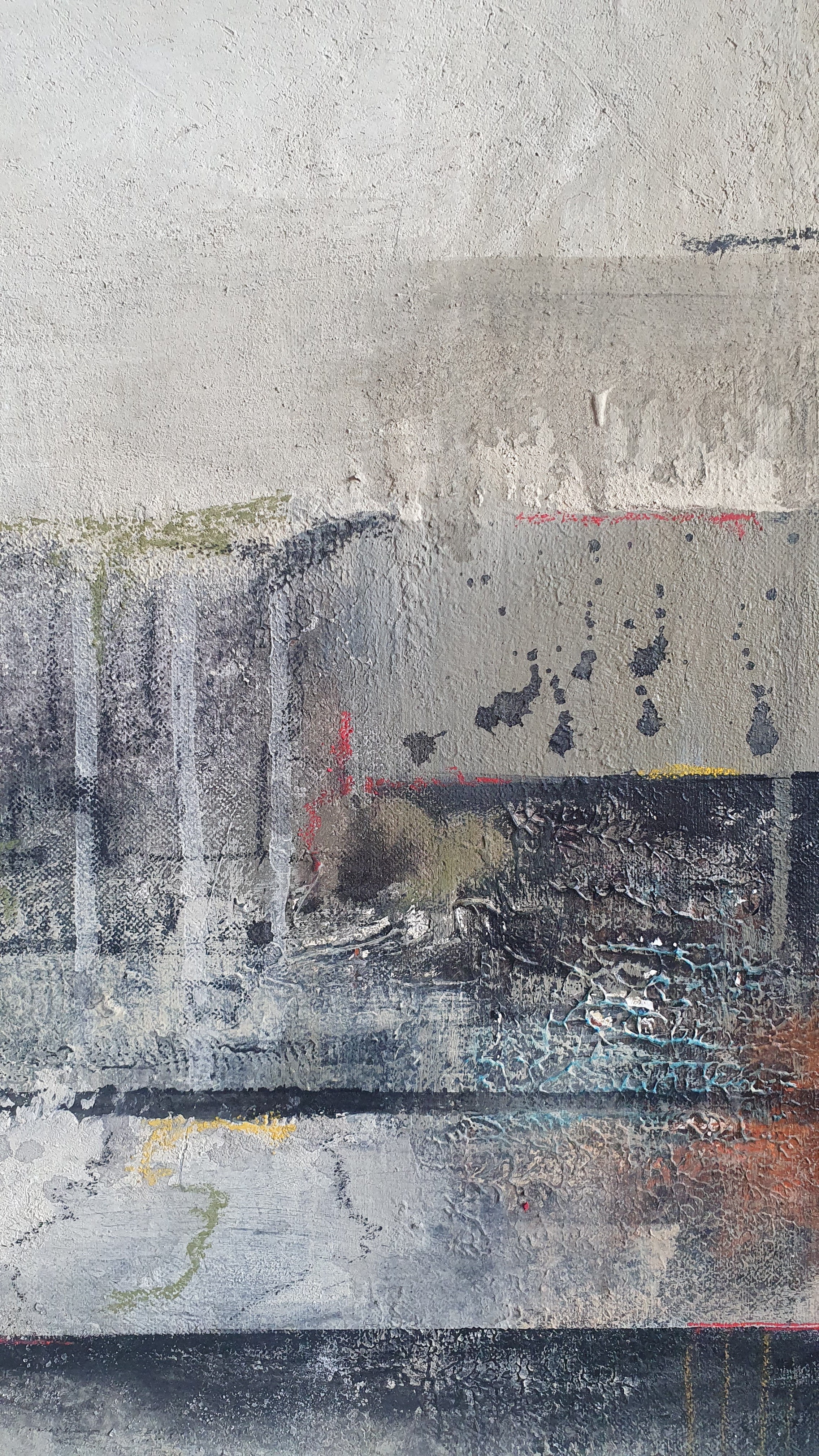 An abstract composition featuring layered horizontal bands of muted earth tones and textured surfaces.