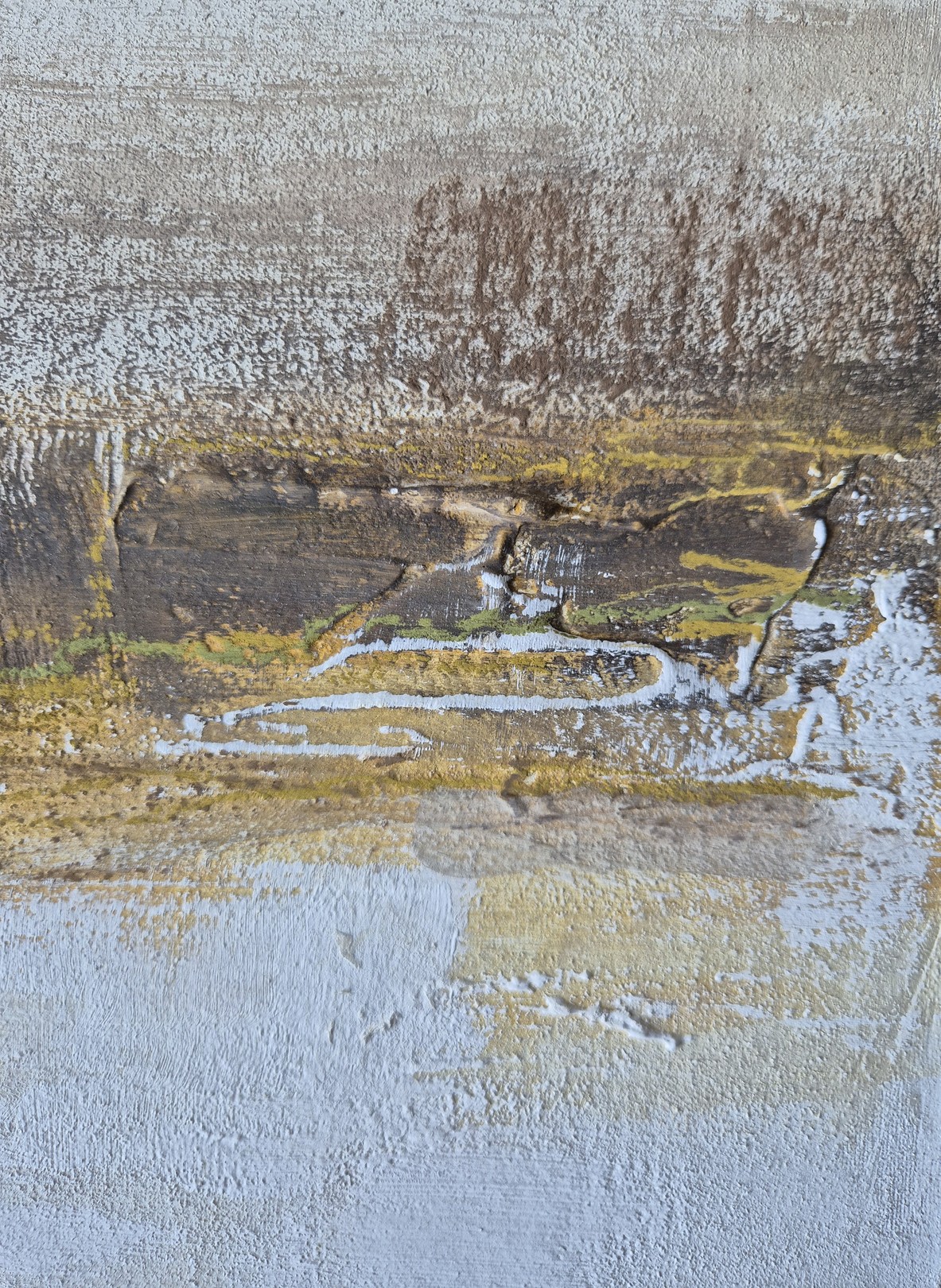 An abstract textured surface with layered earthy tones and white highlights.