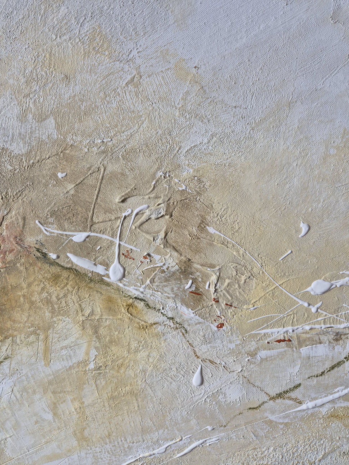 An abstract textured surface featuring thick impasto paint in earthy tones with white drips.