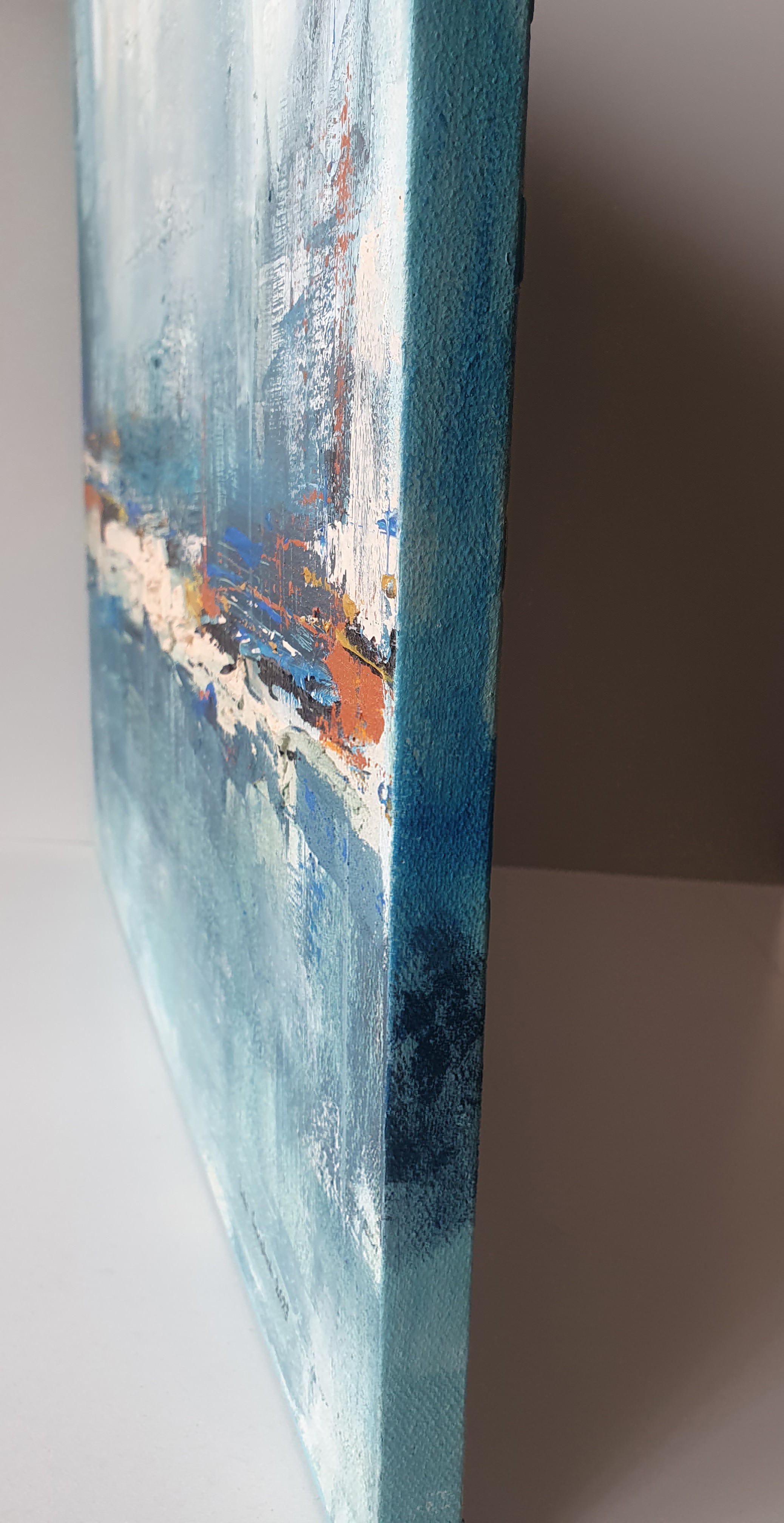 An abstract landscape featuring a rugged coastline with textured brushwork and a cool color palette.