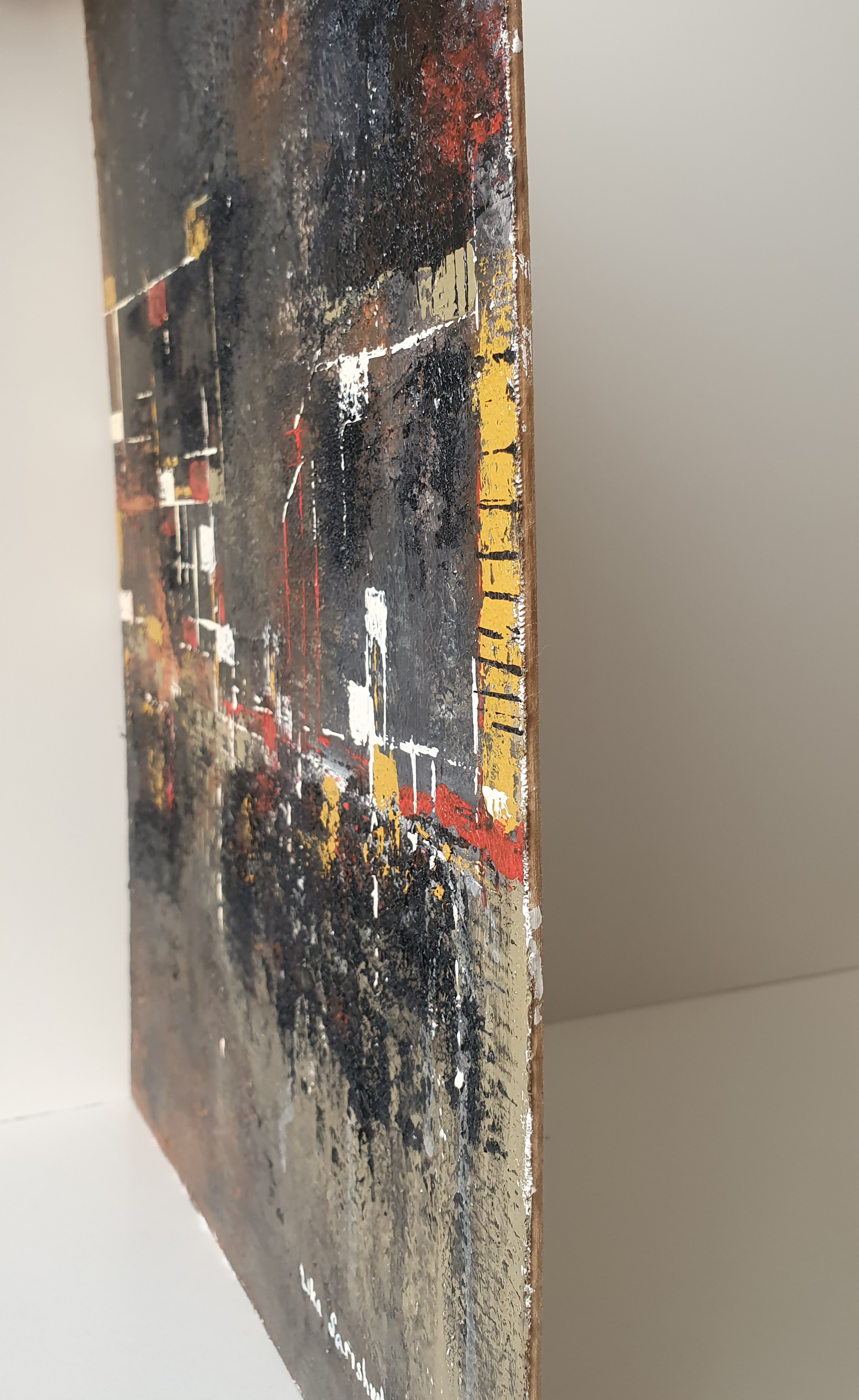 A close up of a painting on a table.