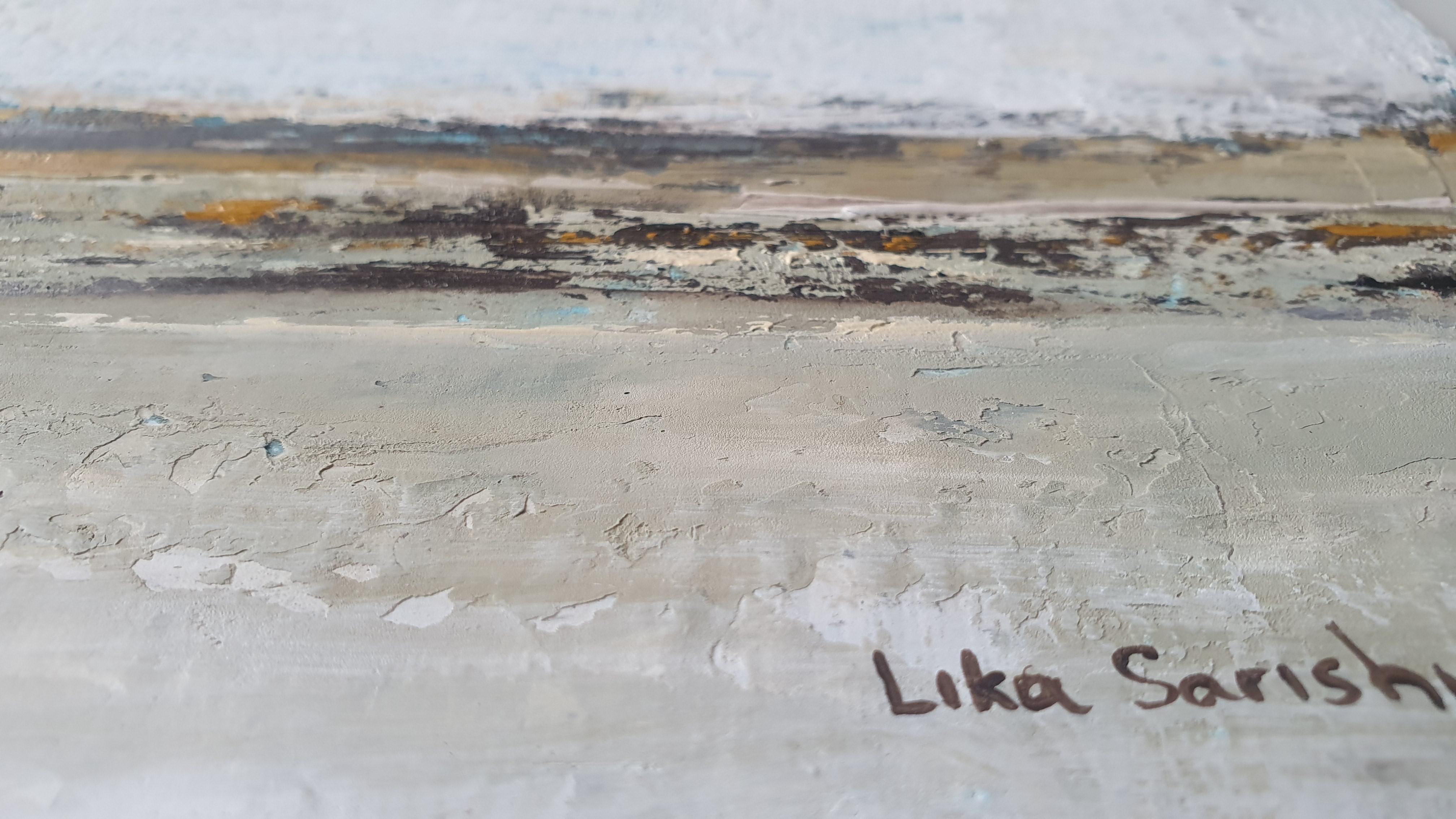 A close up of a painting on a wall.