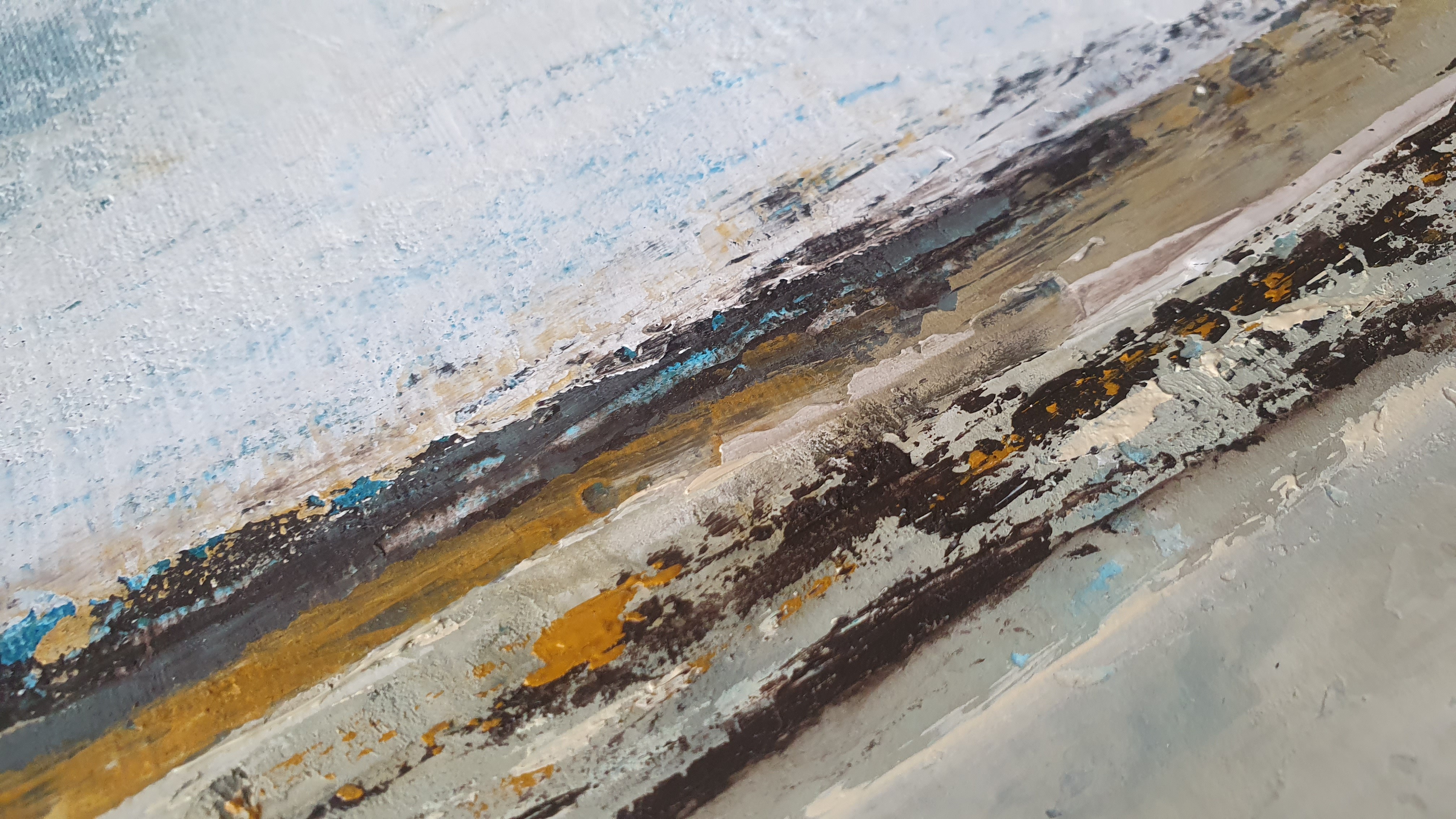 A close up of a painting on a wall.