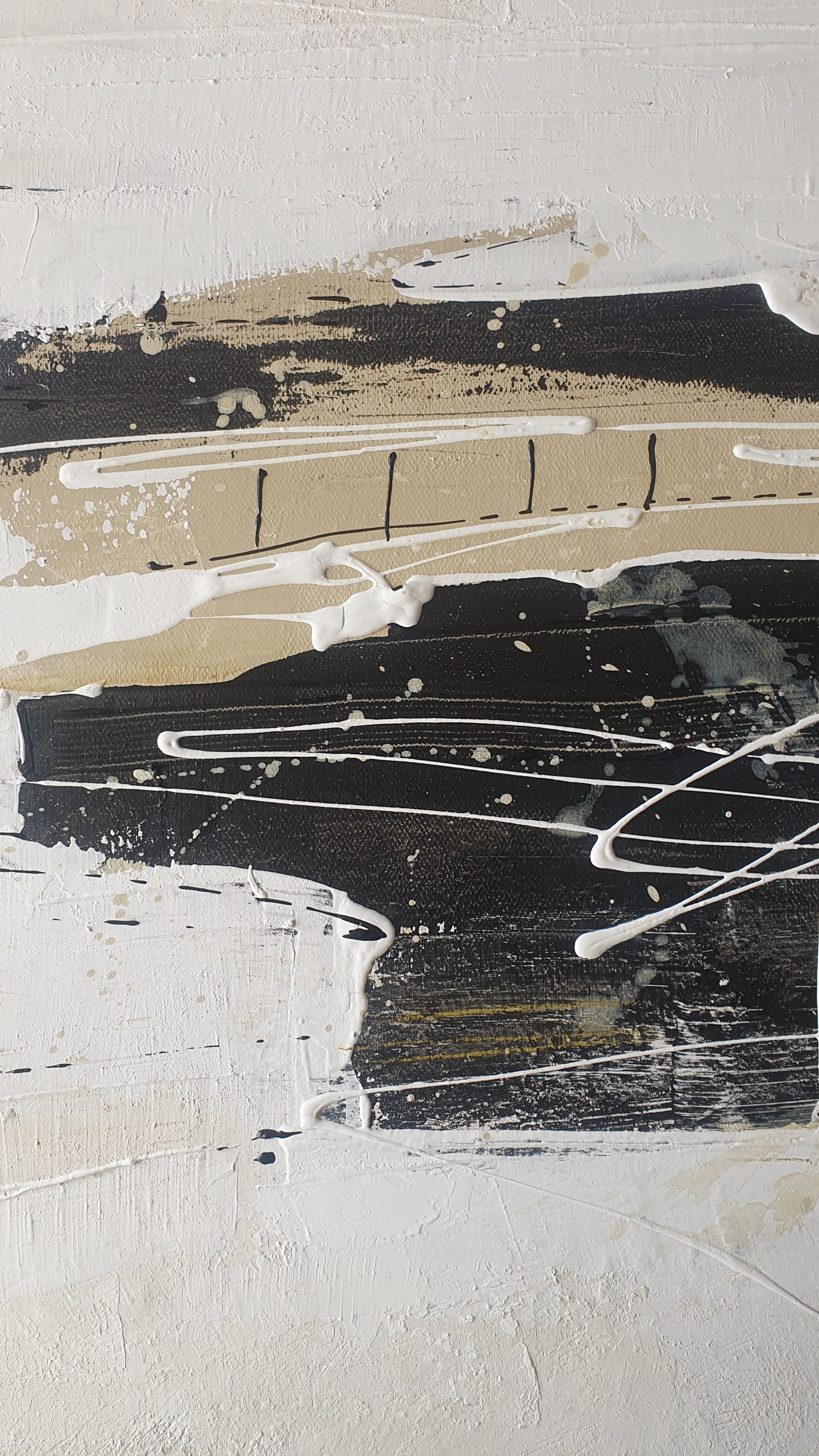 A painting with black and white paint on a white background.