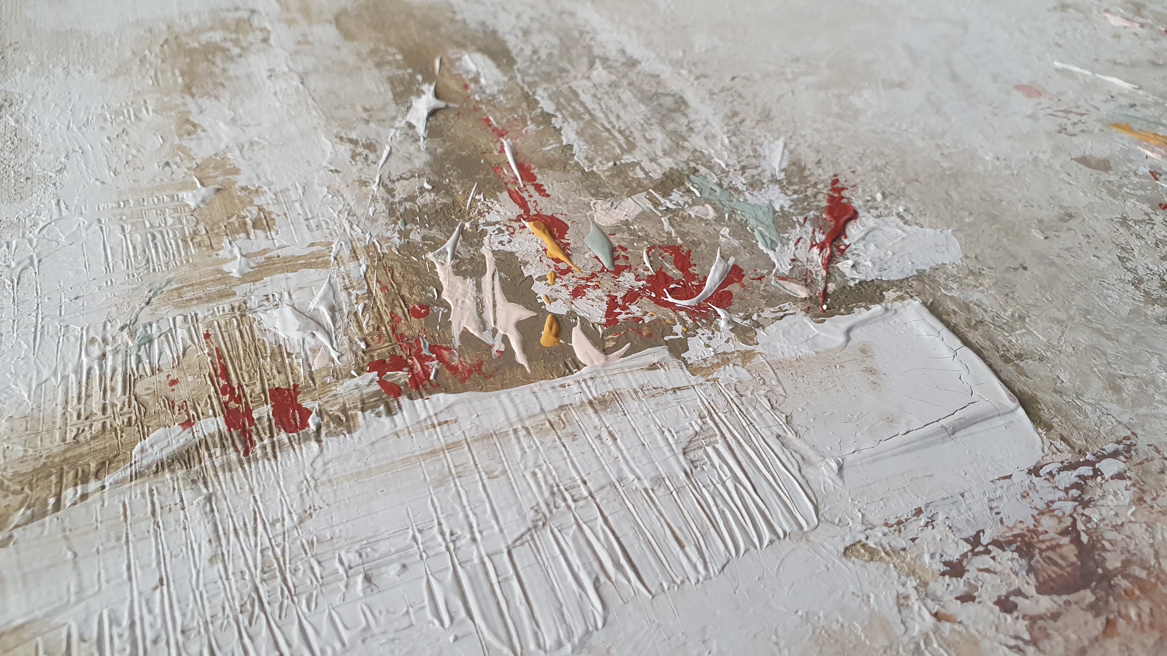 A close up of a painting on a wall. 