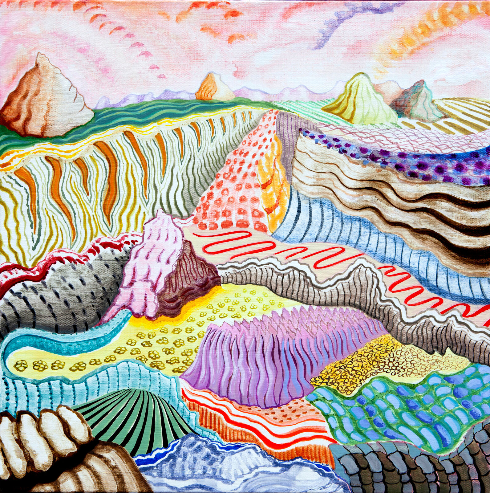 A vibrant, patterned landscape of layered hills and strange formations under a pink sky.