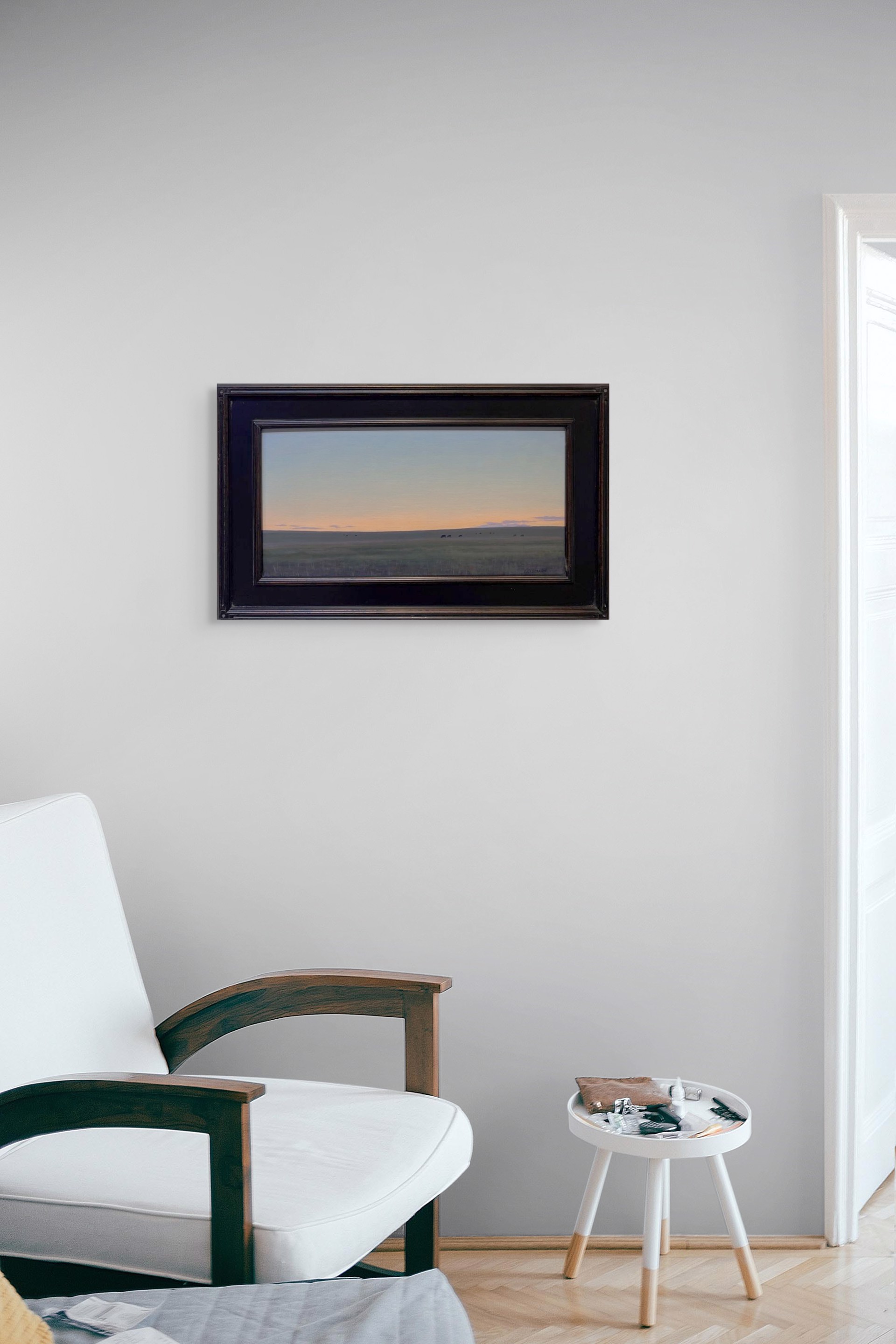 A painting of a herd of cattle grazing in a field at sunset.