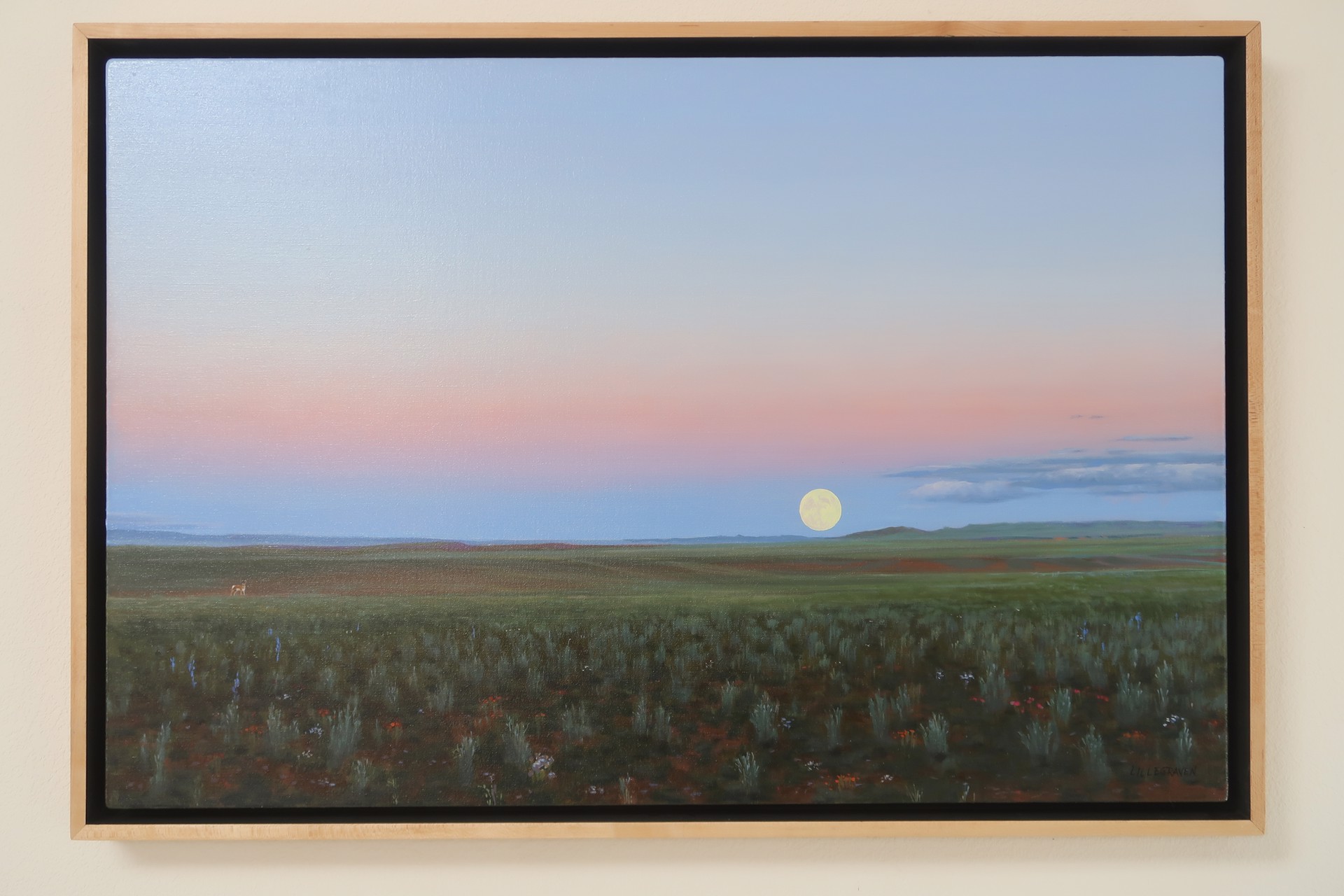 A painting of a field with a full moon in the sky.