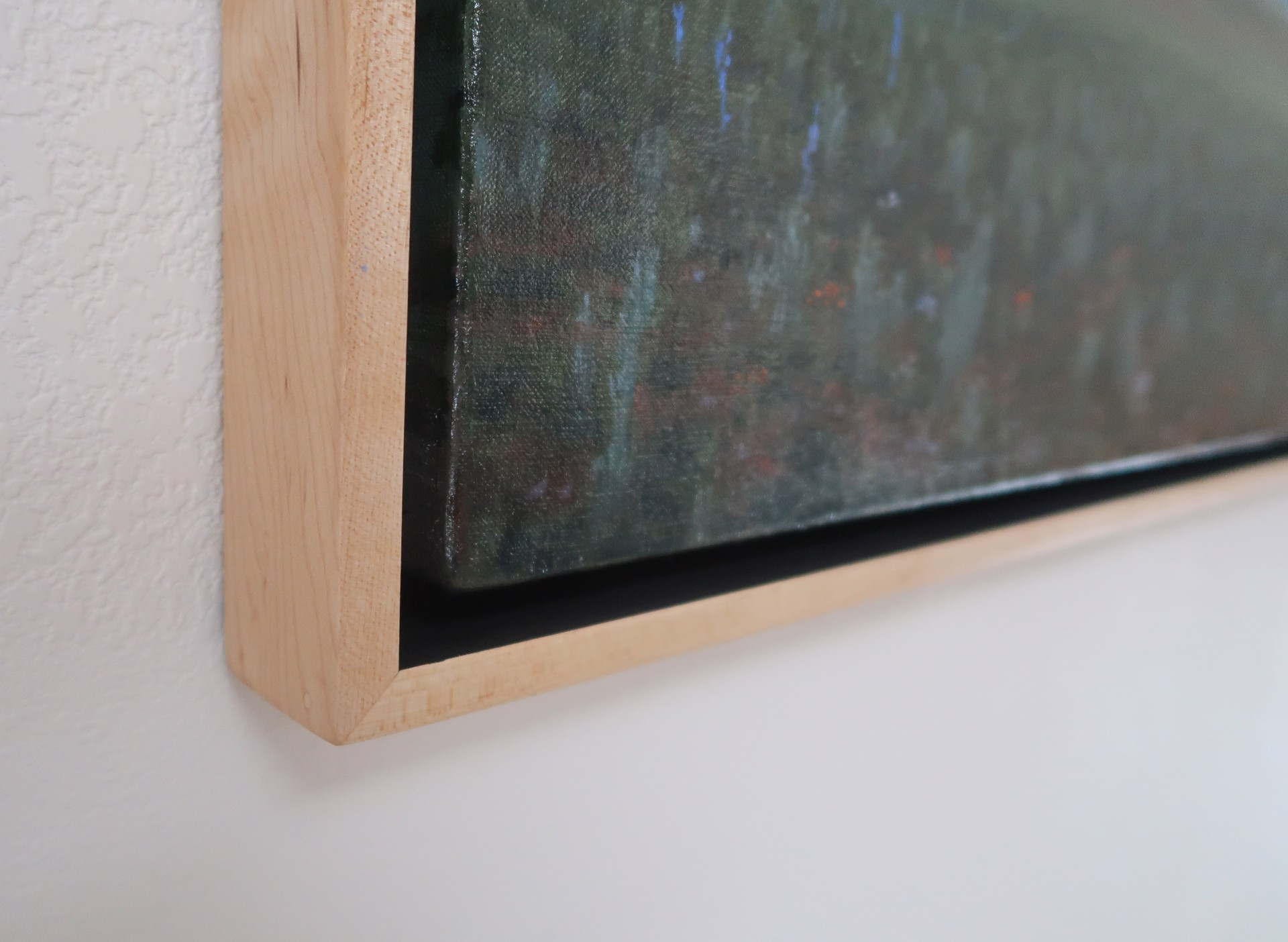 A painting of a field with a full moon in the sky.