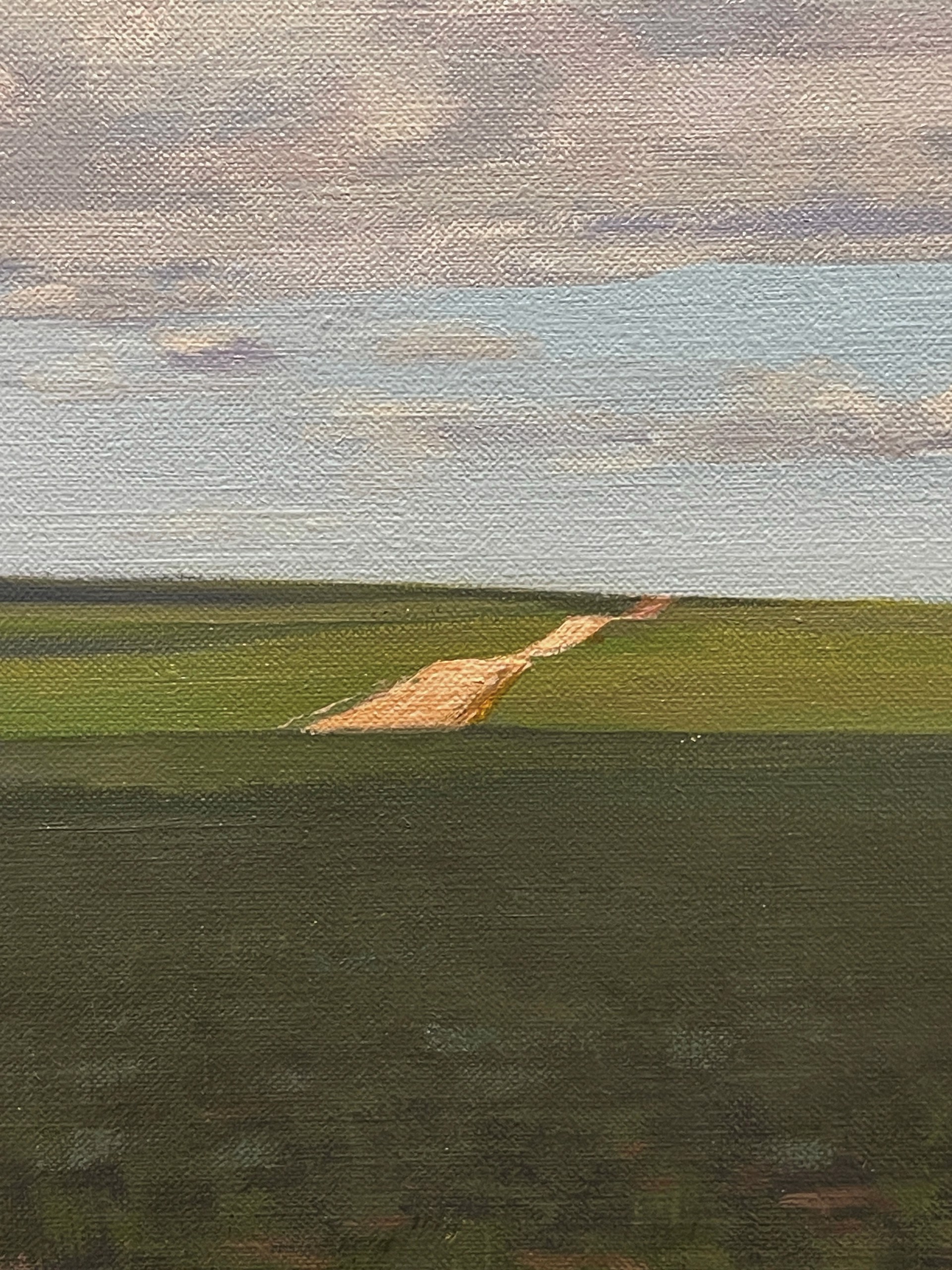 A vast landscape painting of rolling green fields under a blue sky filled with fluffy white clouds.