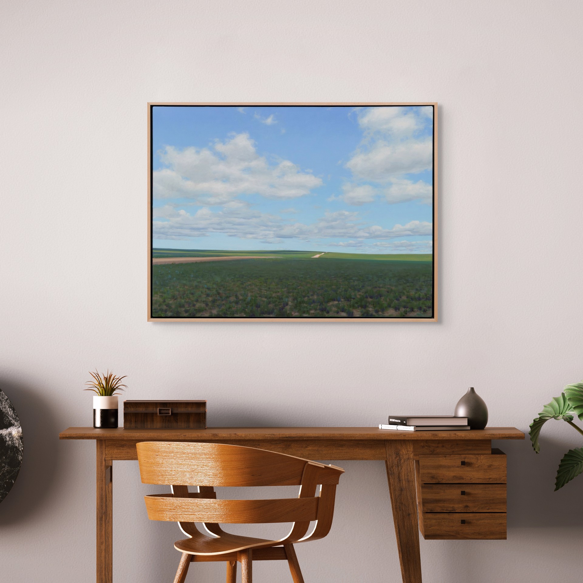 A vast landscape painting of rolling green fields under a blue sky filled with fluffy white clouds.