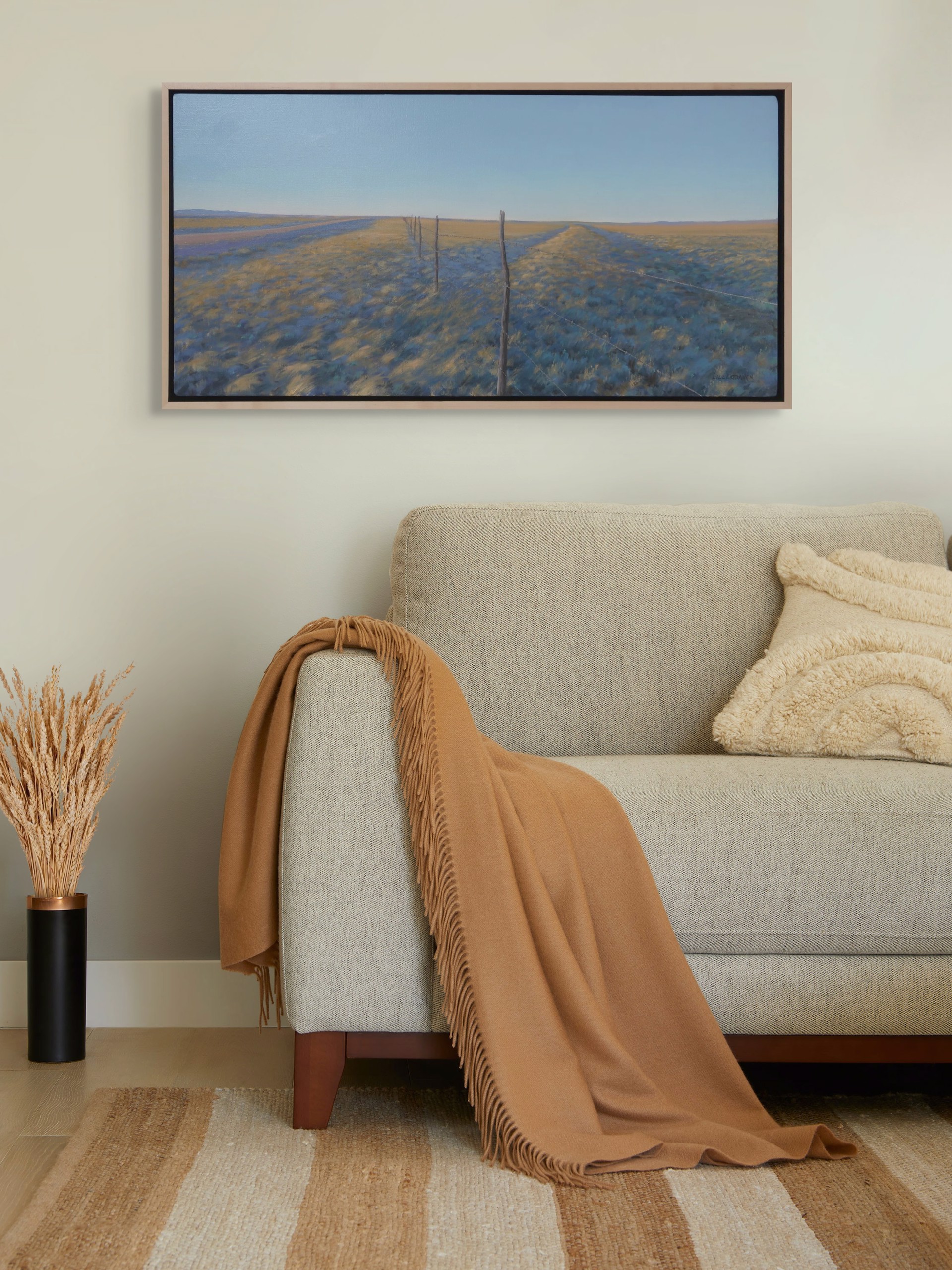 A painting of a field with a fence in the middle.
