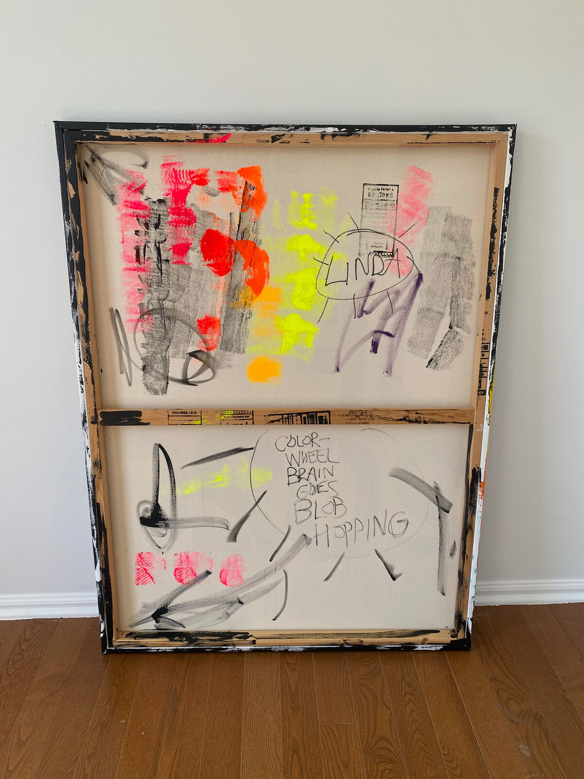 A painting of a person with a colorful wheel on their head.