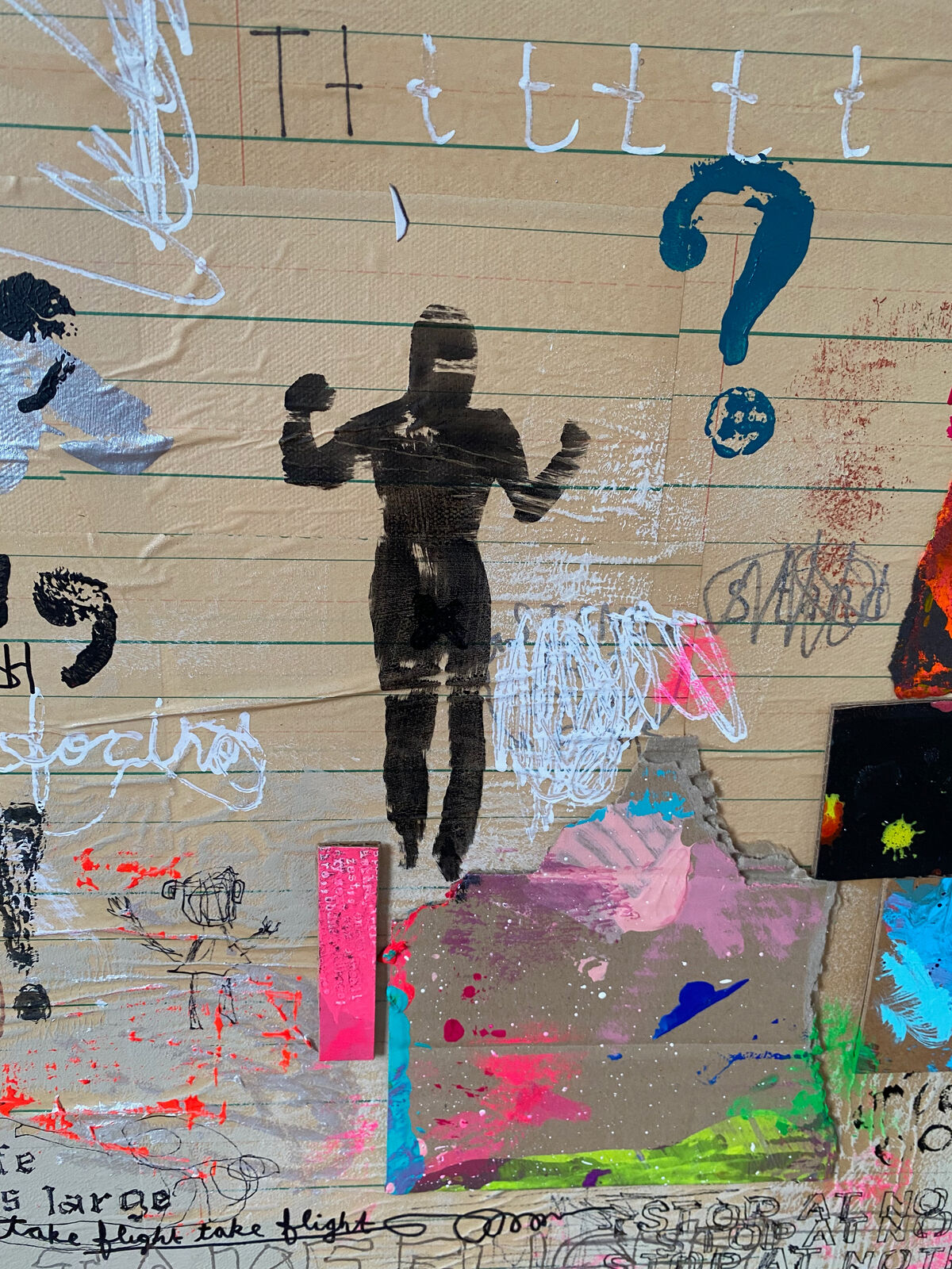 A collage of the word hustle on a wall covered in graffiti.