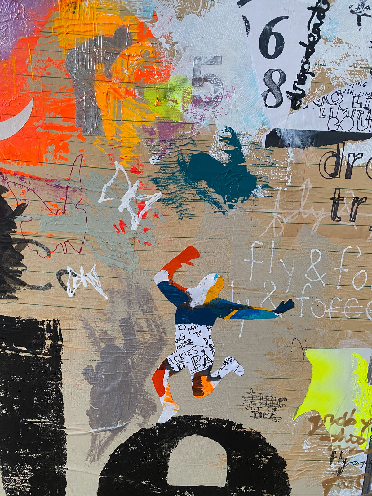 A collage of the word hustle on a wall covered in graffiti.