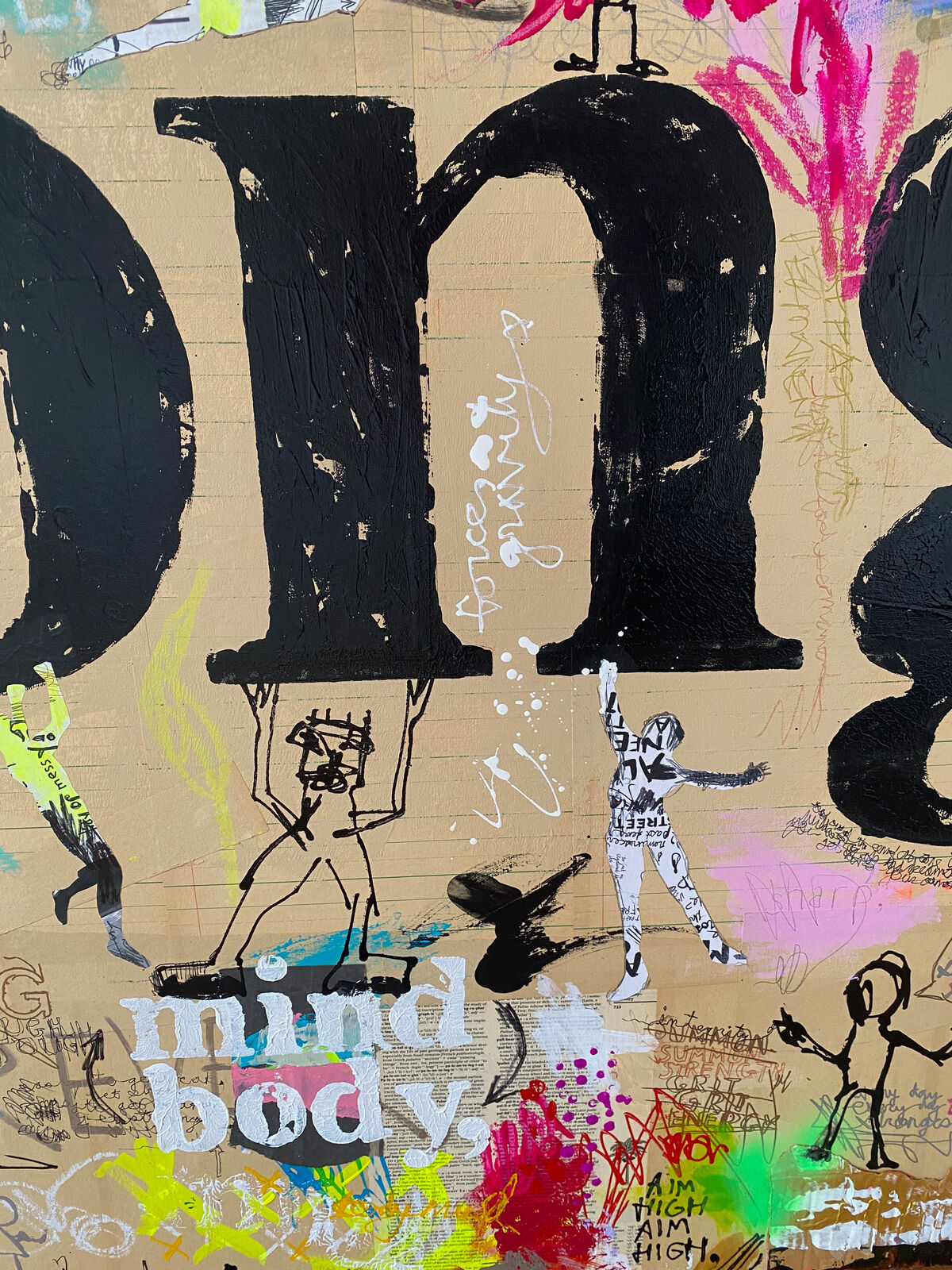 A painting with the word STRONG written on it. 