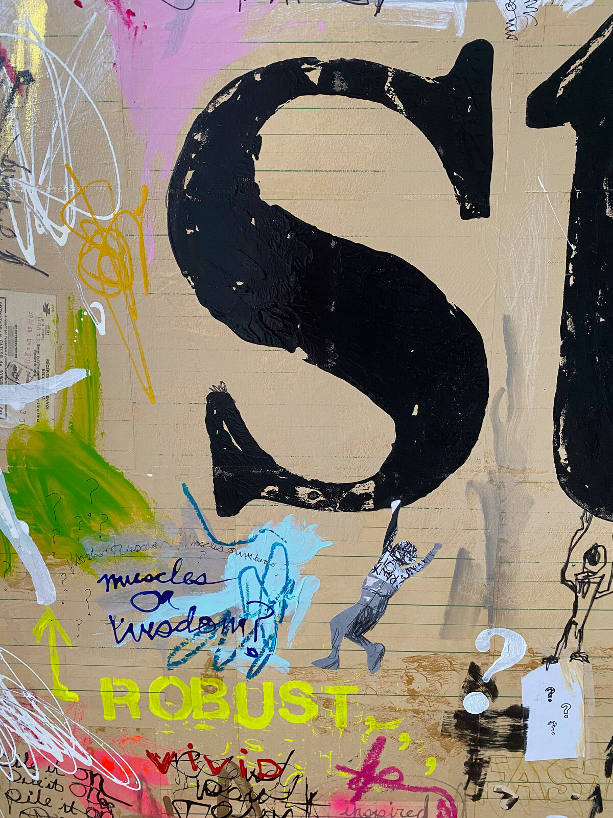 A painting with the word STRONG written on it. 