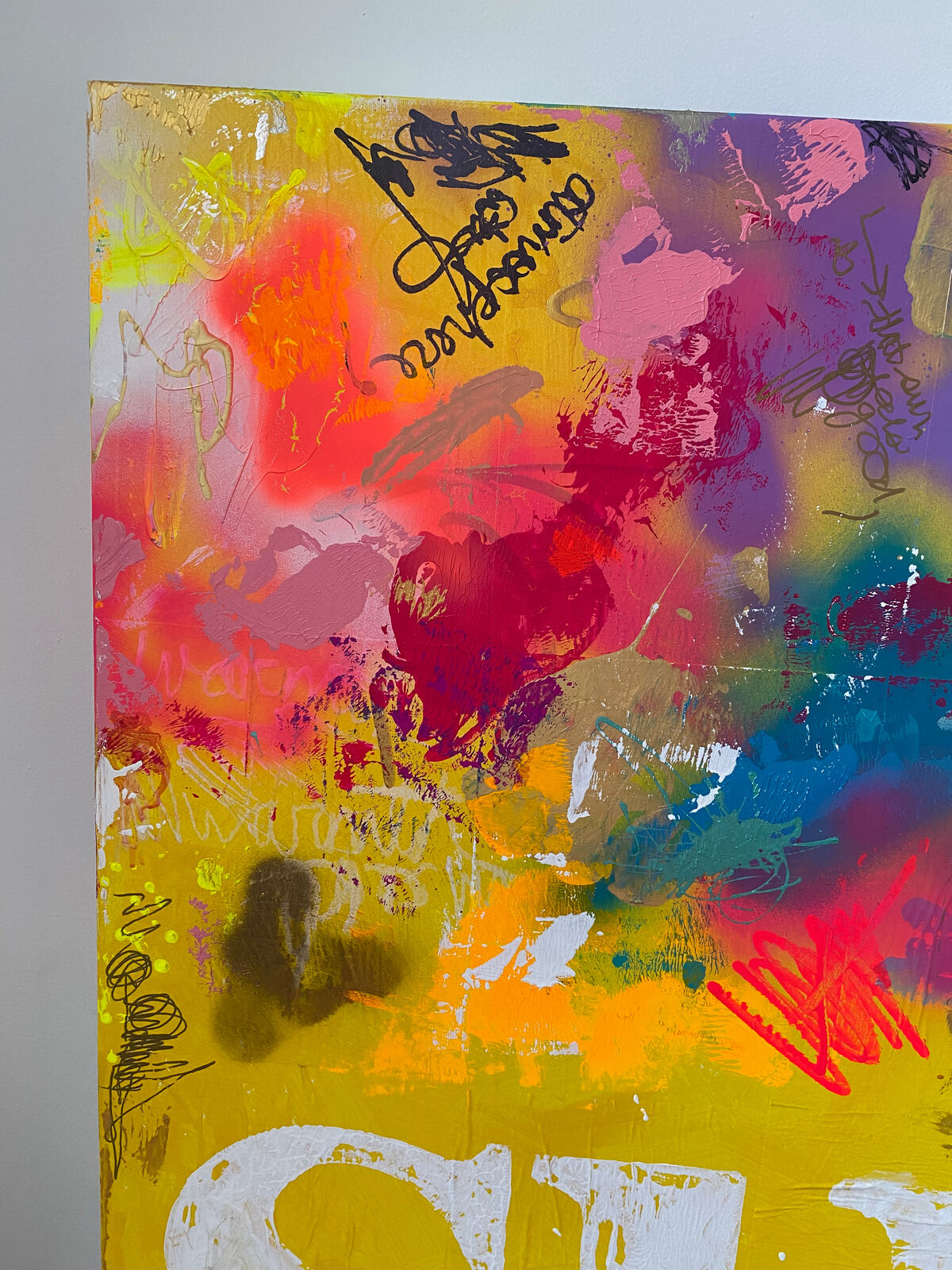 A painting of a person standing in front of a yellow background with the word sunshine painted on it.