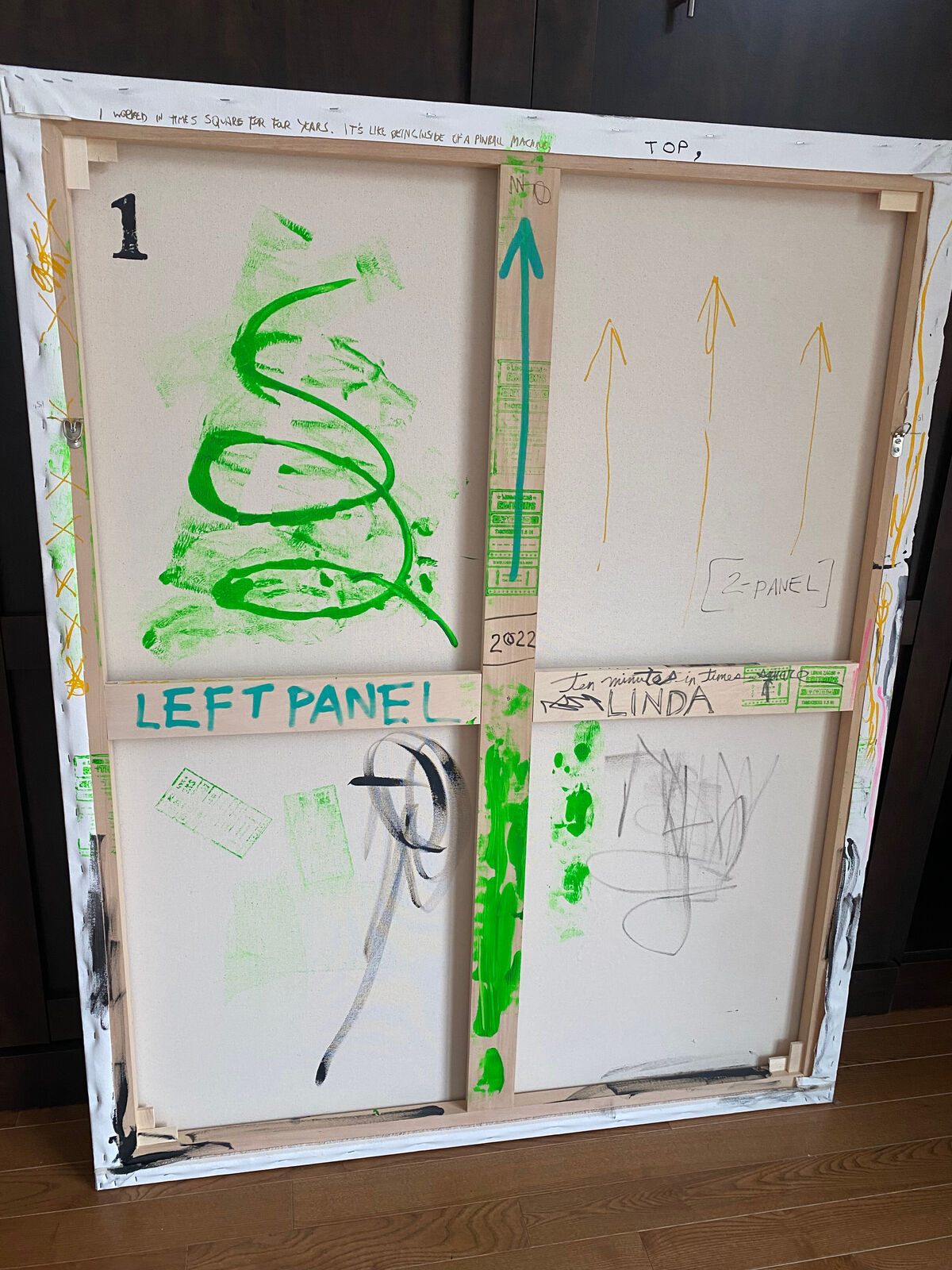 A painting of a wall covered in graffiti with the words ten minutes in times square.