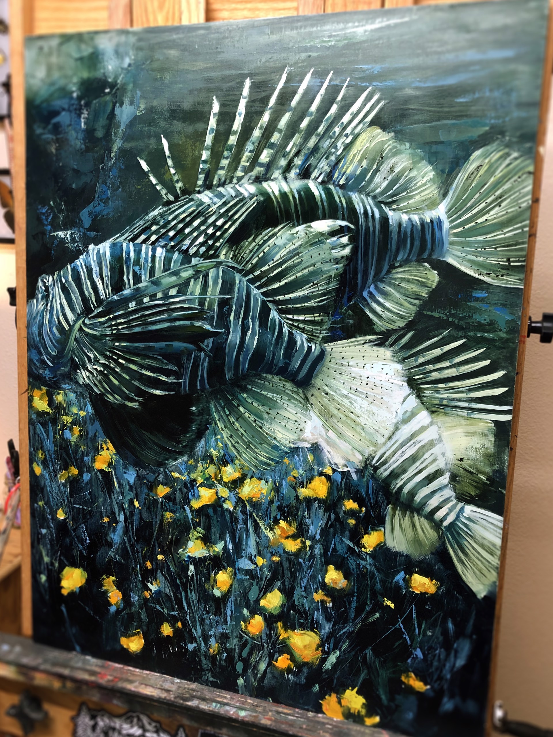 A painting of a lionfish in a field of yellow flowers.