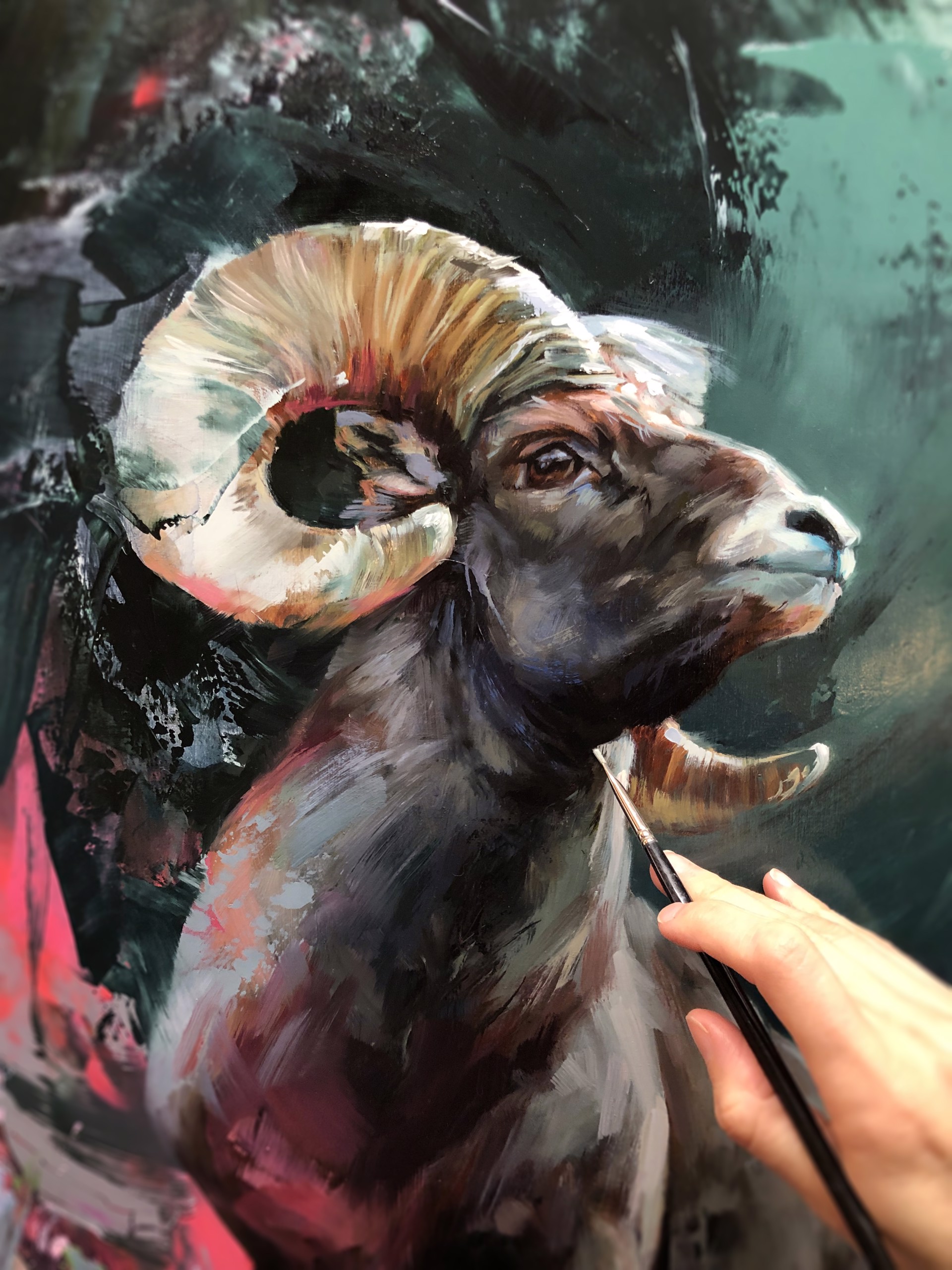 A painting of a ram standing on a rock surrounded by flowers.