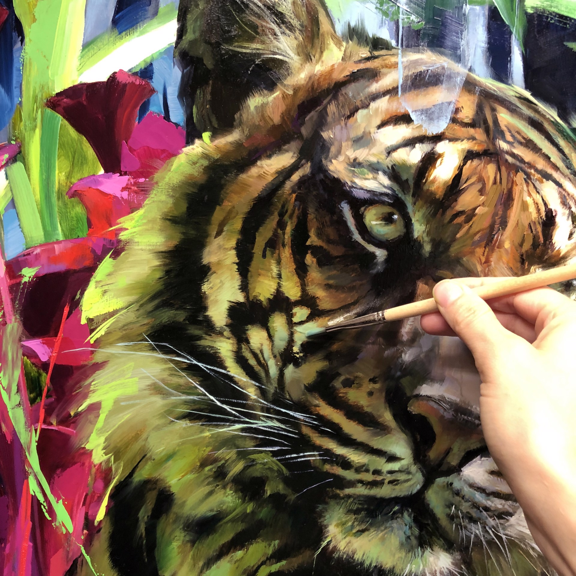A painting of a tiger laying down in a field of flowers.
