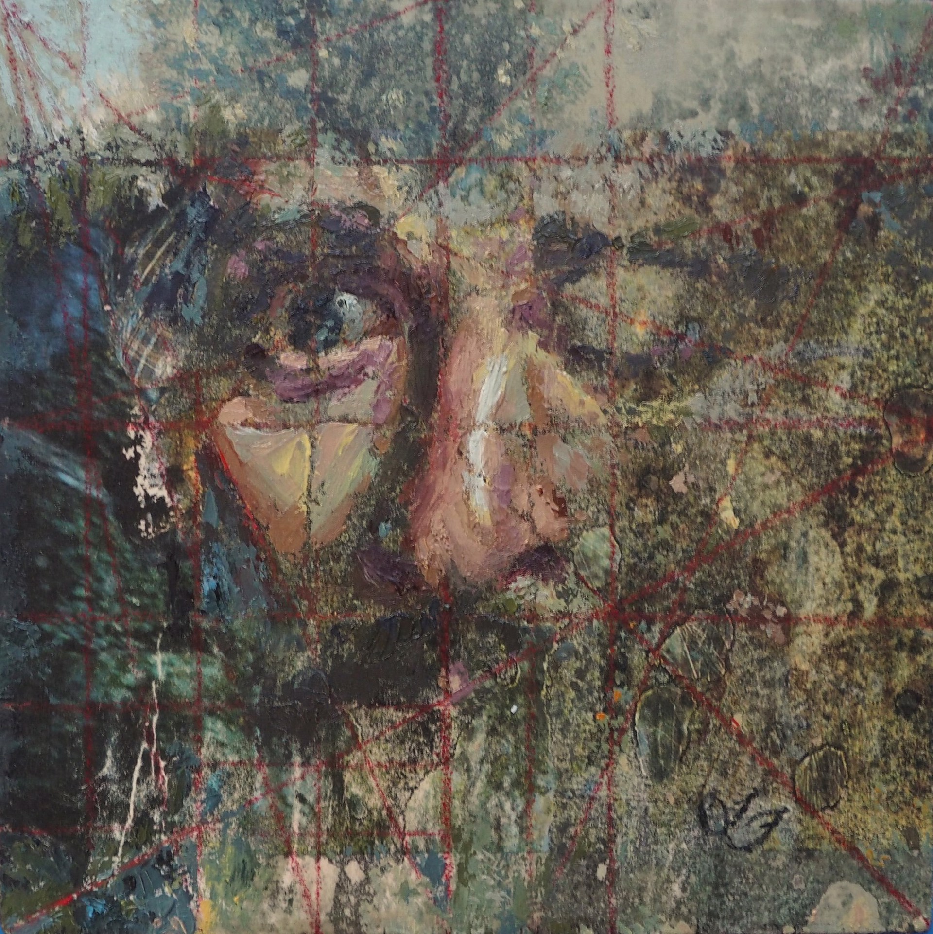 A painting of a woman's face on a piece of paper.
