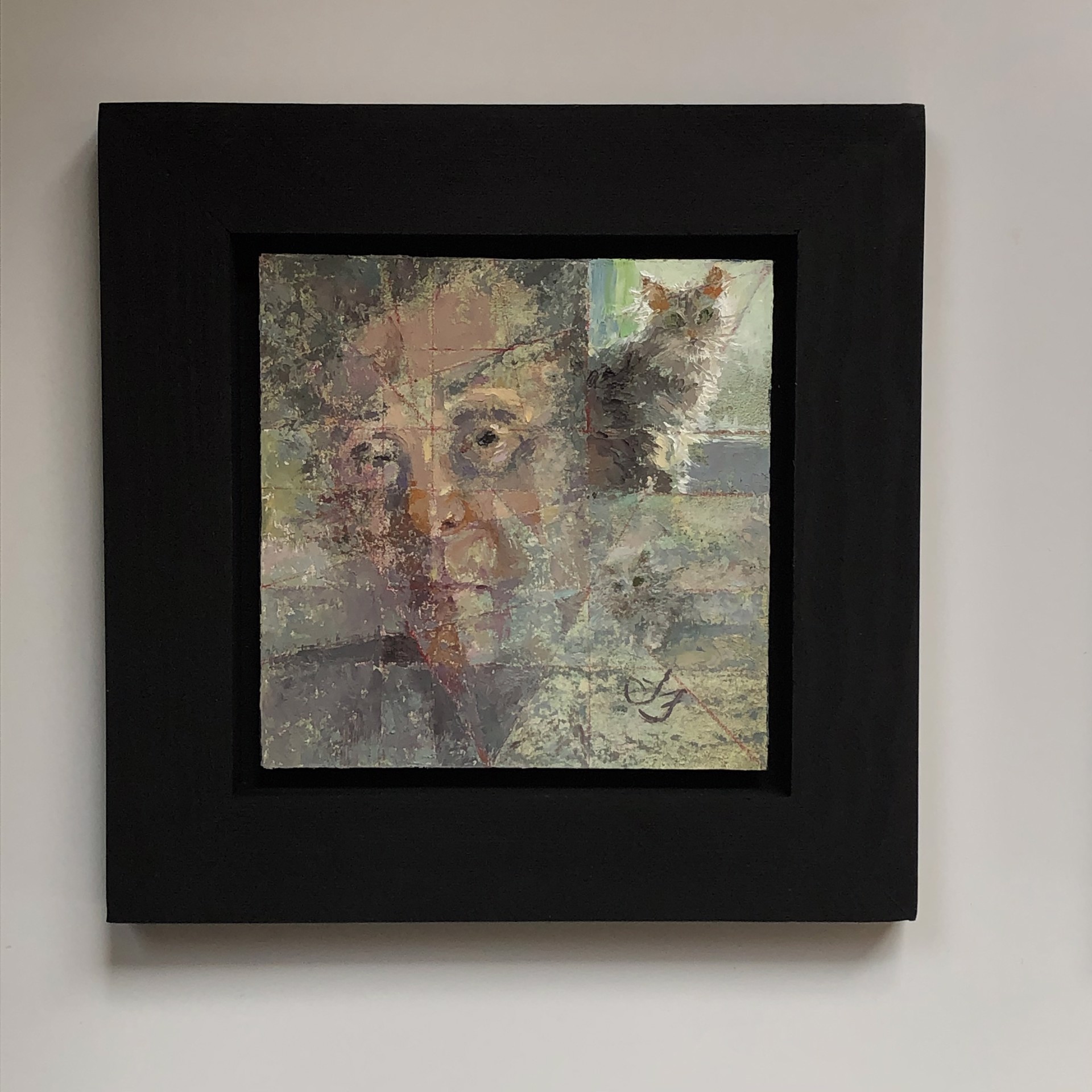 A painting of a man with a cat on his shoulder.