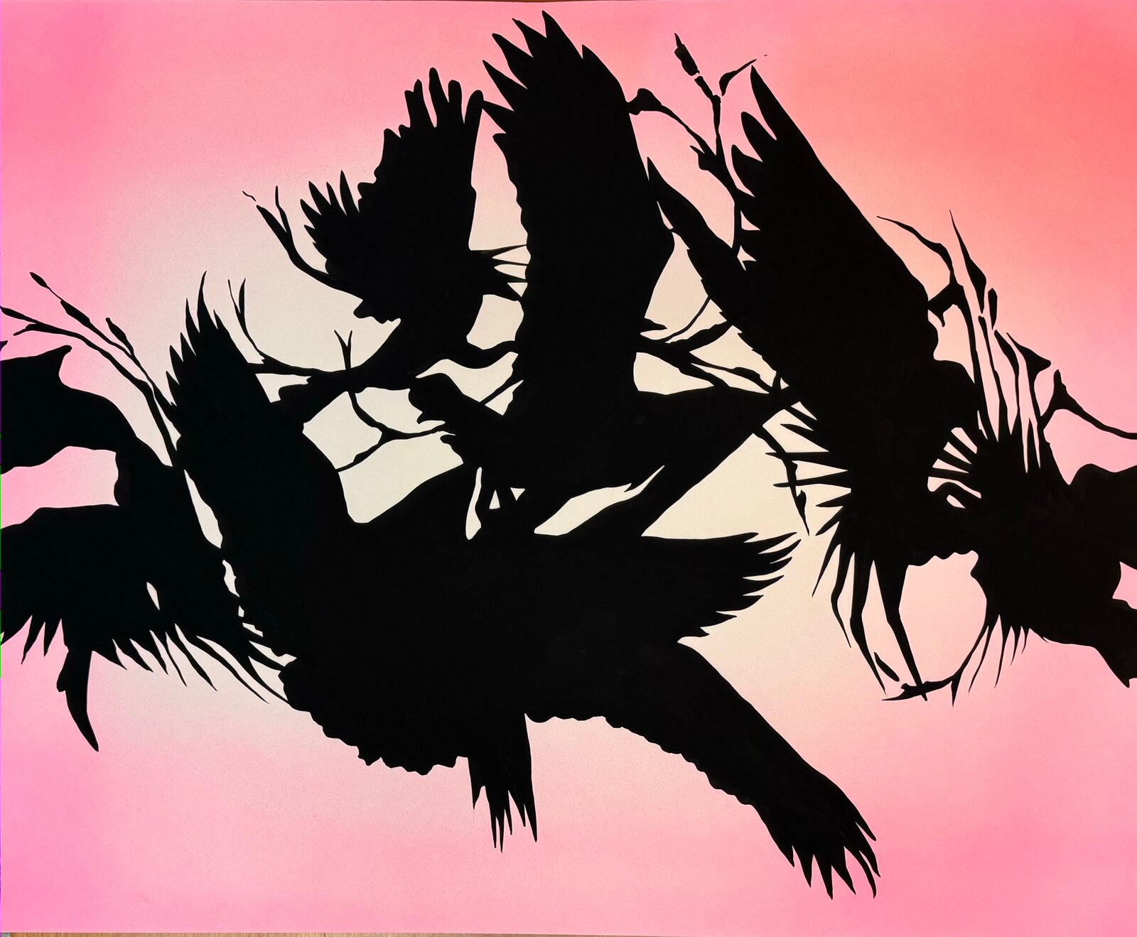 A striking silhouette of multiple birds in flight against a soft pink gradient background.