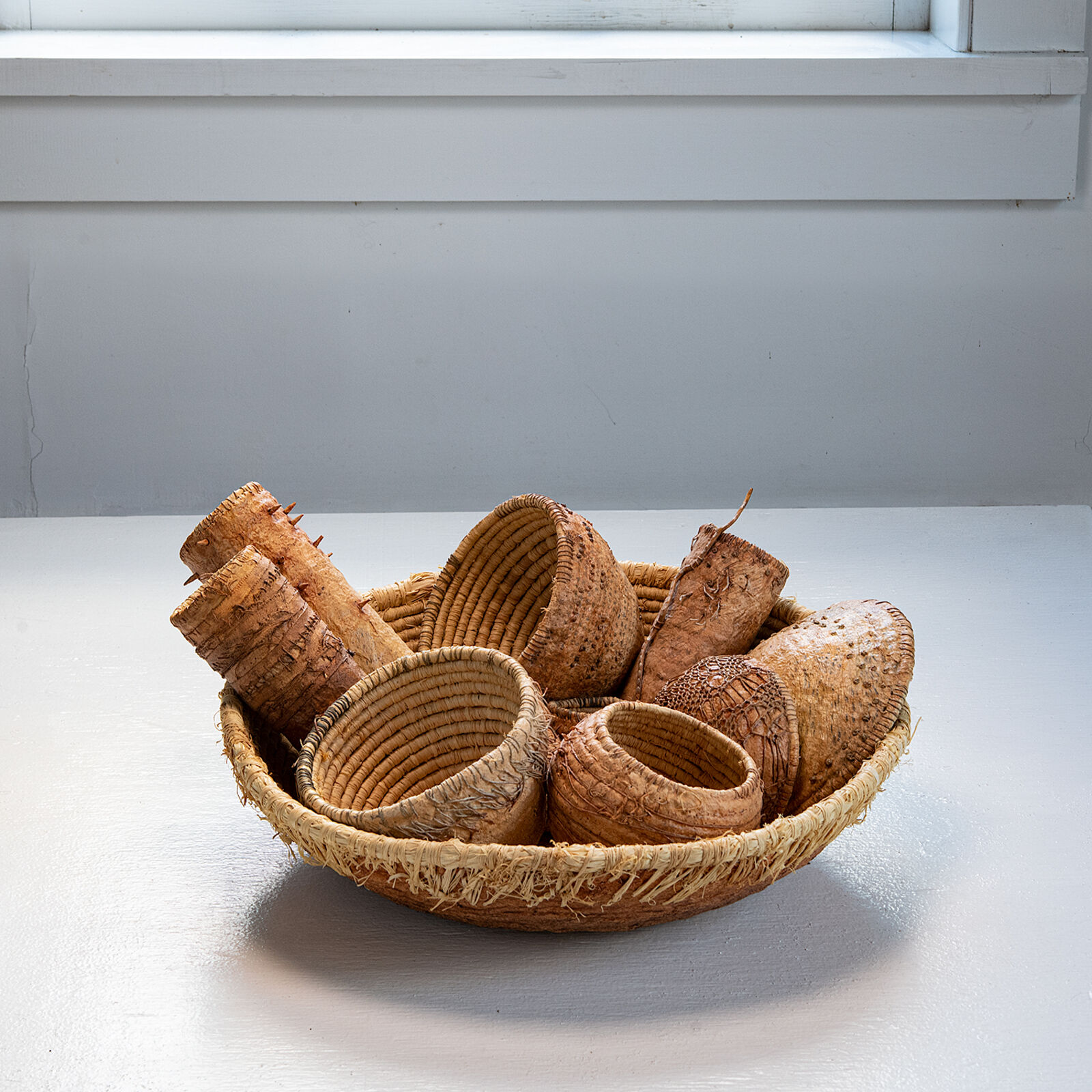 A basket filled with baskets sitting on top of a table.