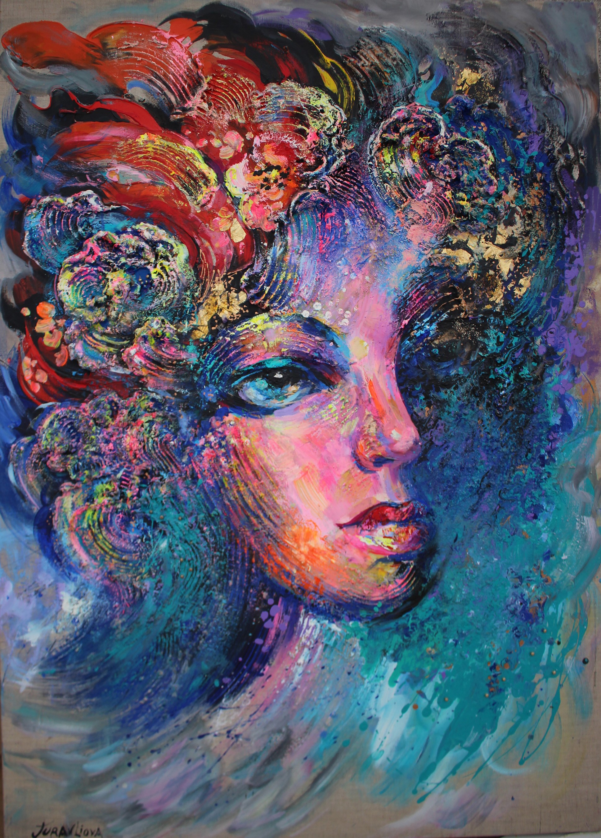 A painting of a woman's face with colorful hair.