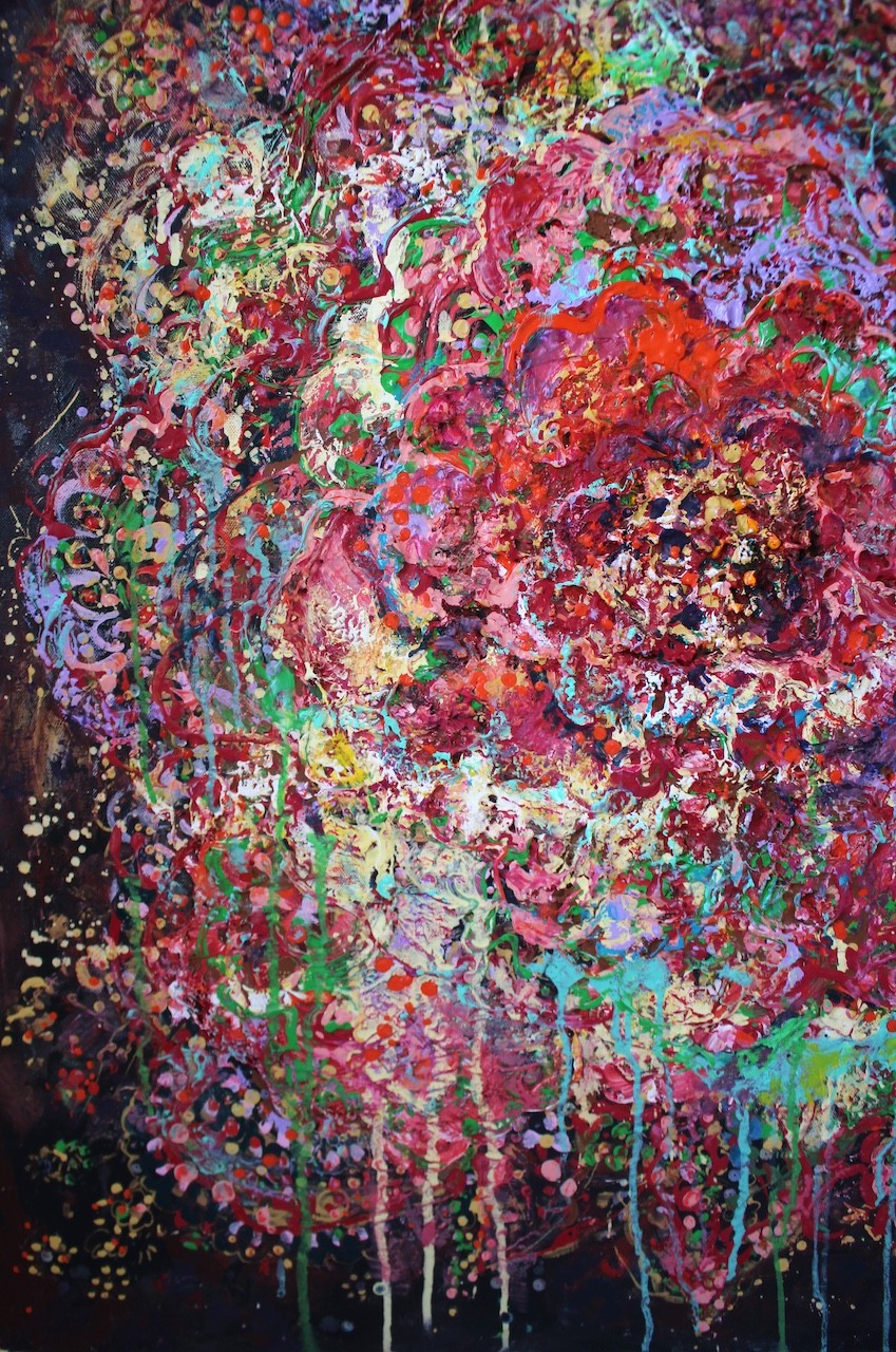A vibrant abstract floral explosion bursting with reds, pinks, and greens against a dark void.