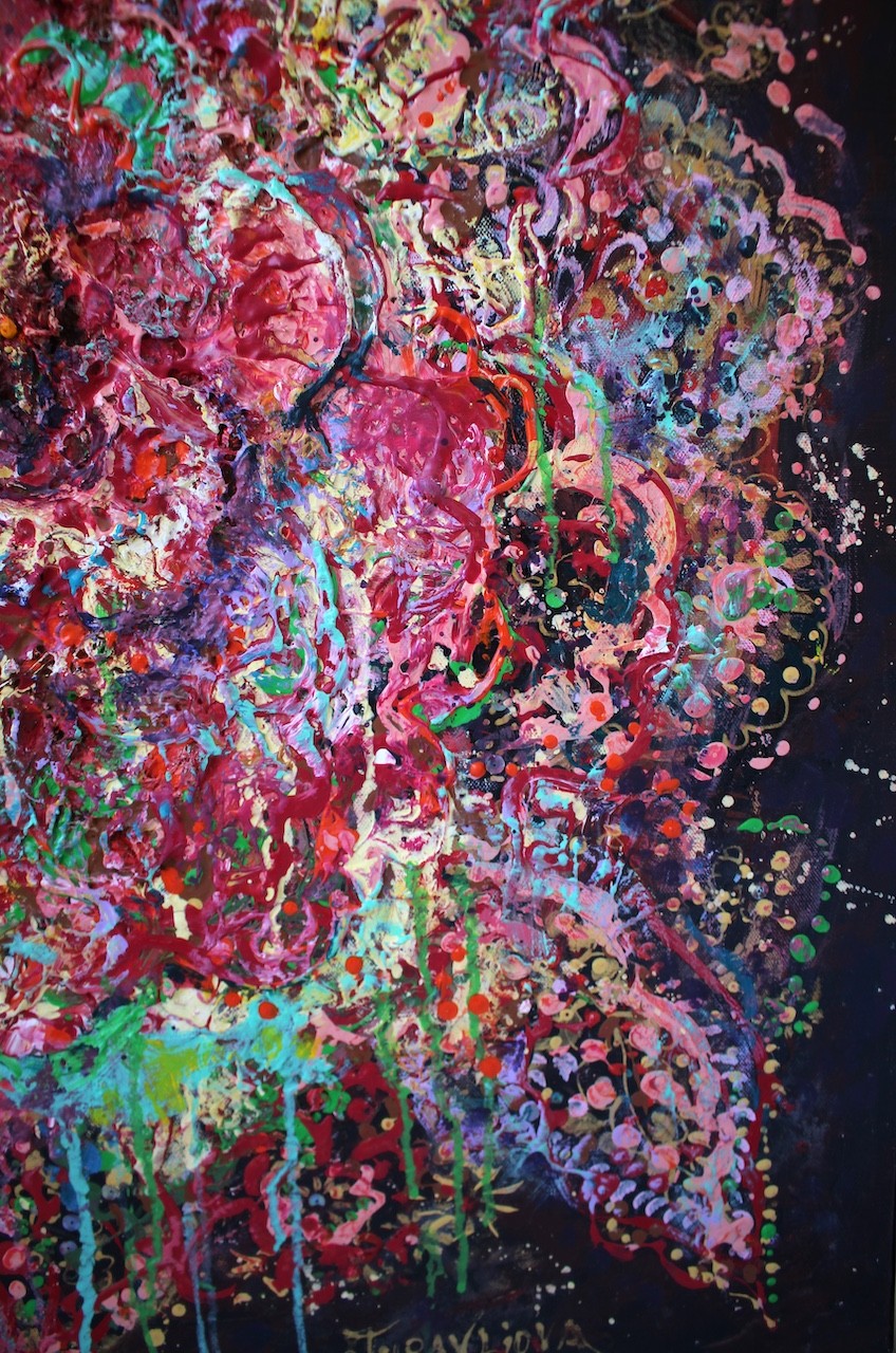 A vibrant abstract floral explosion bursting with reds, pinks, and greens against a dark void.