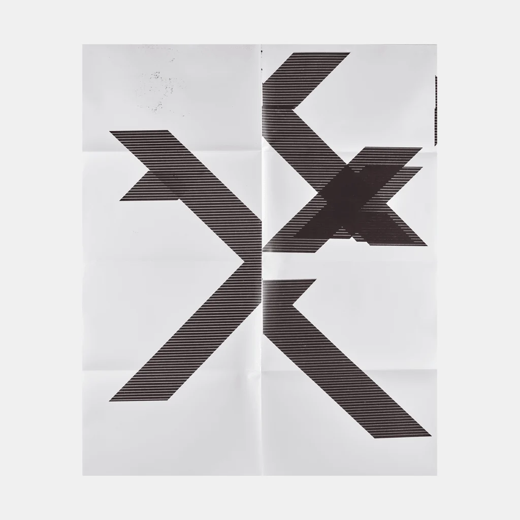 A graphic print featuring a large, striped letter X on a white background.