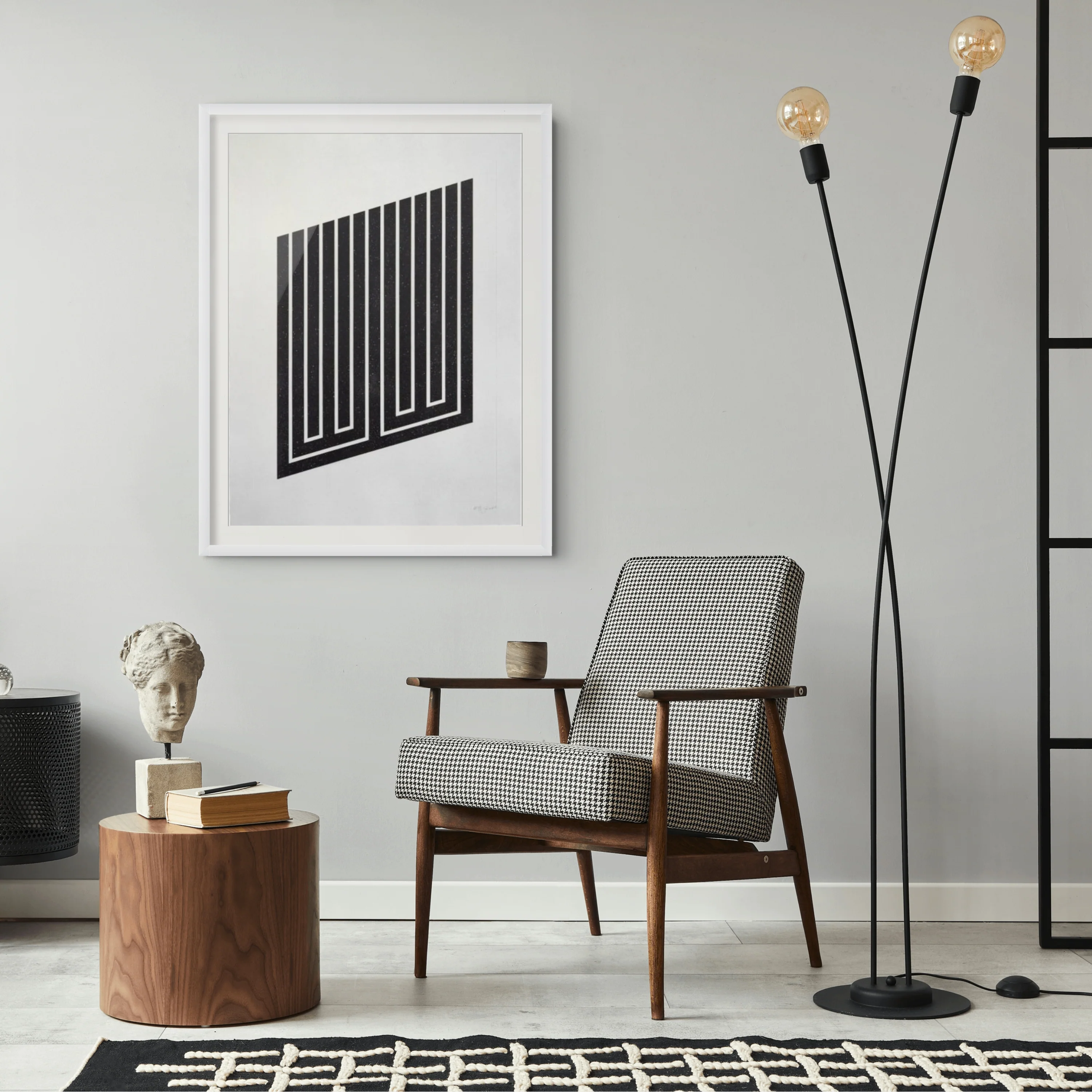 A minimalist black-and-white graphic print featuring a geometric, three-dimensional illusion of stacked rectangular blocks.