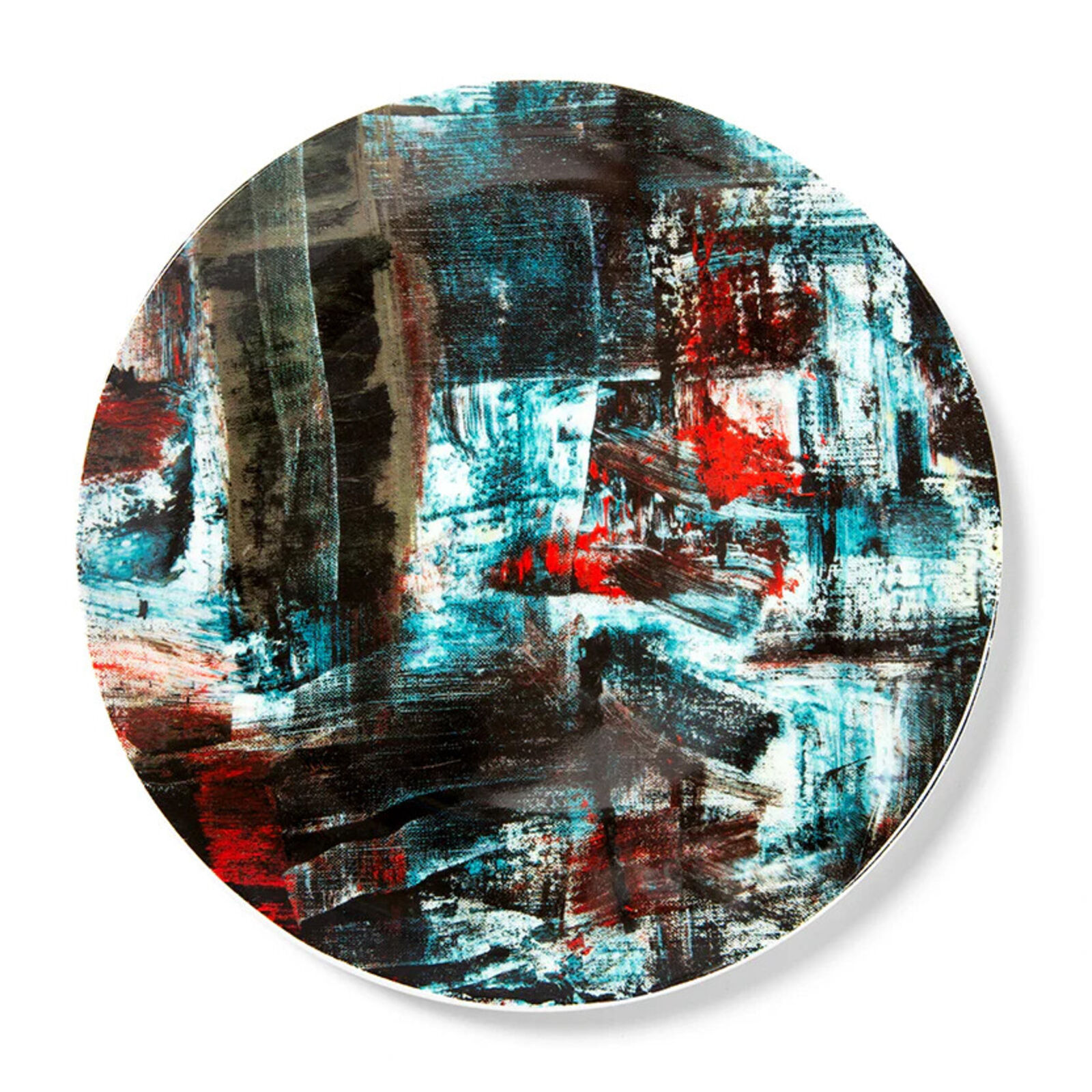 A round plate with a painting on it. 