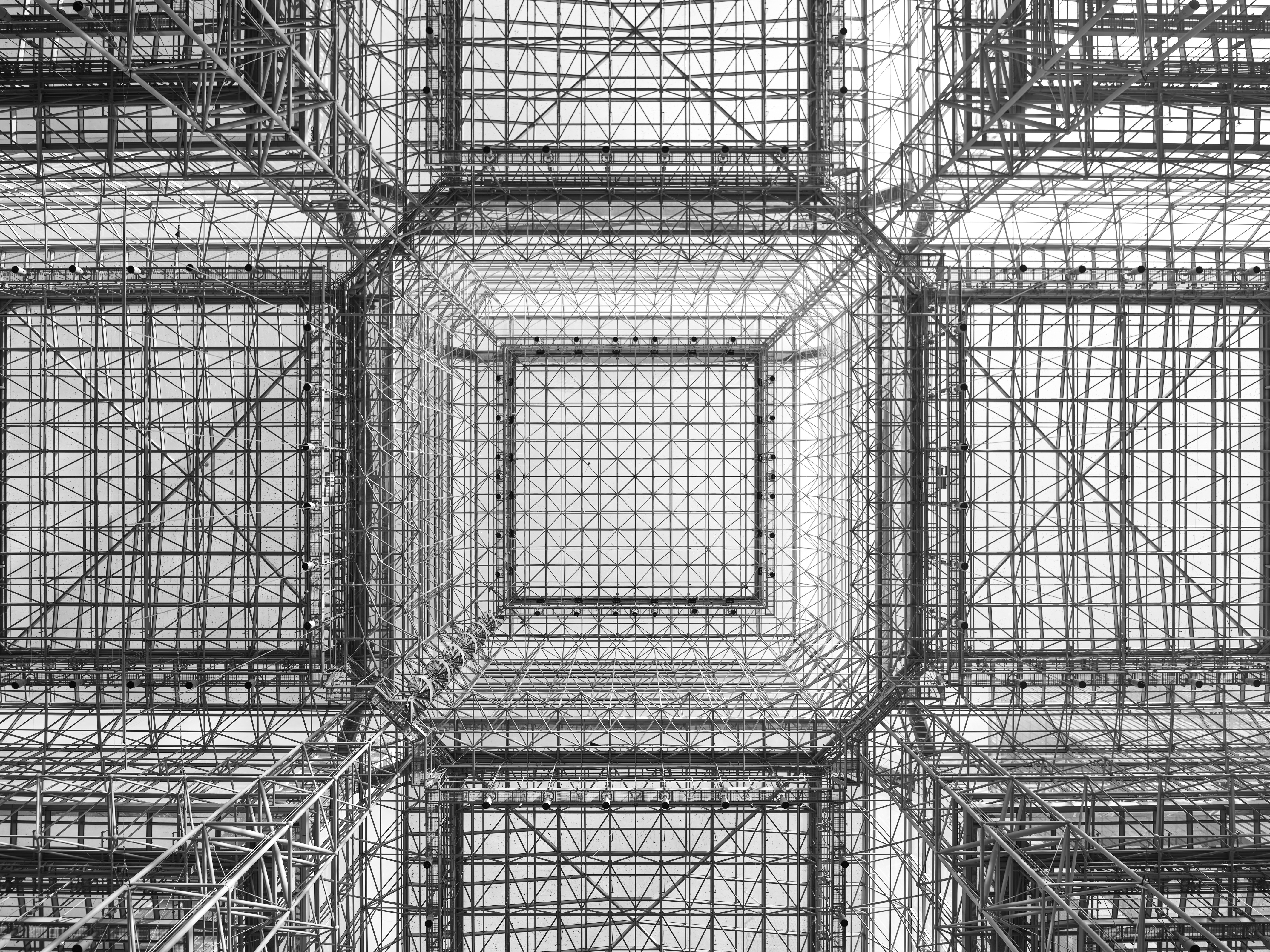 A black and white photo of a metal structure.