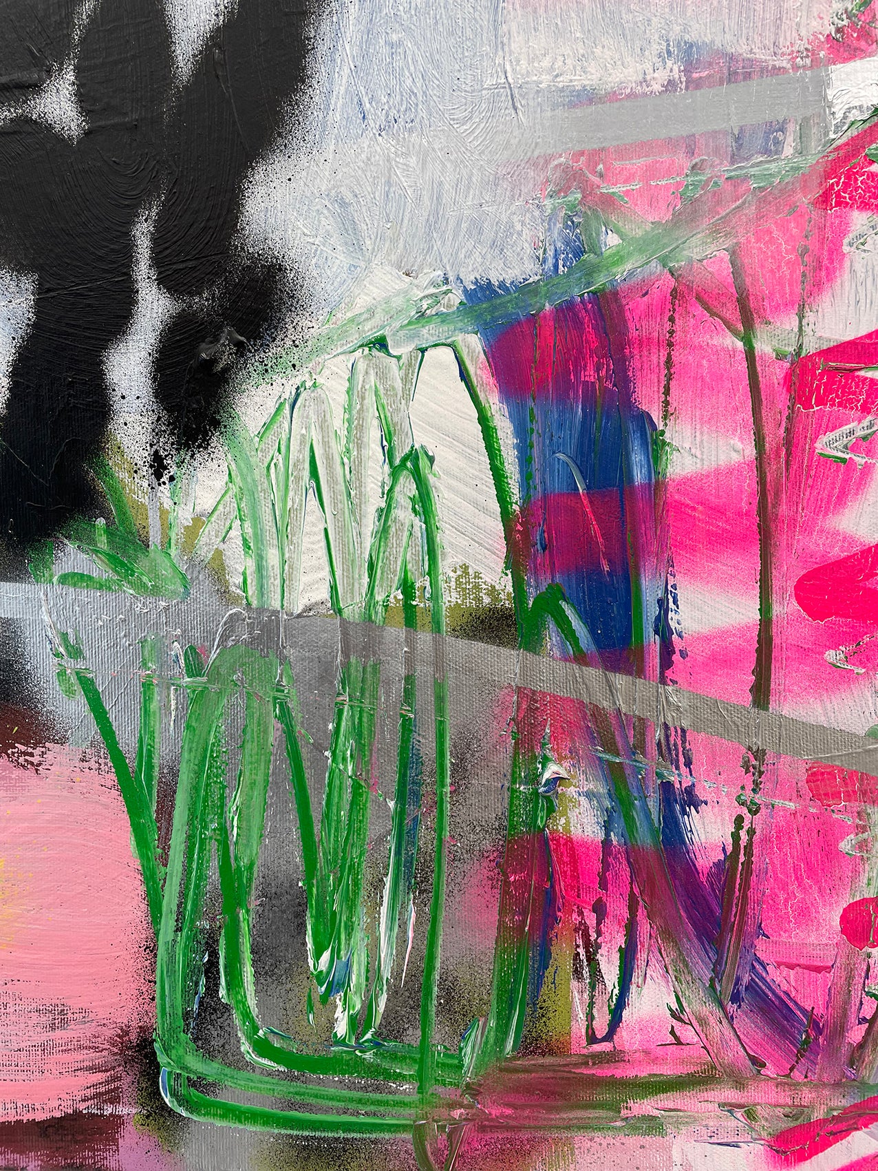 A painting on a white wall with a black and yellow design.