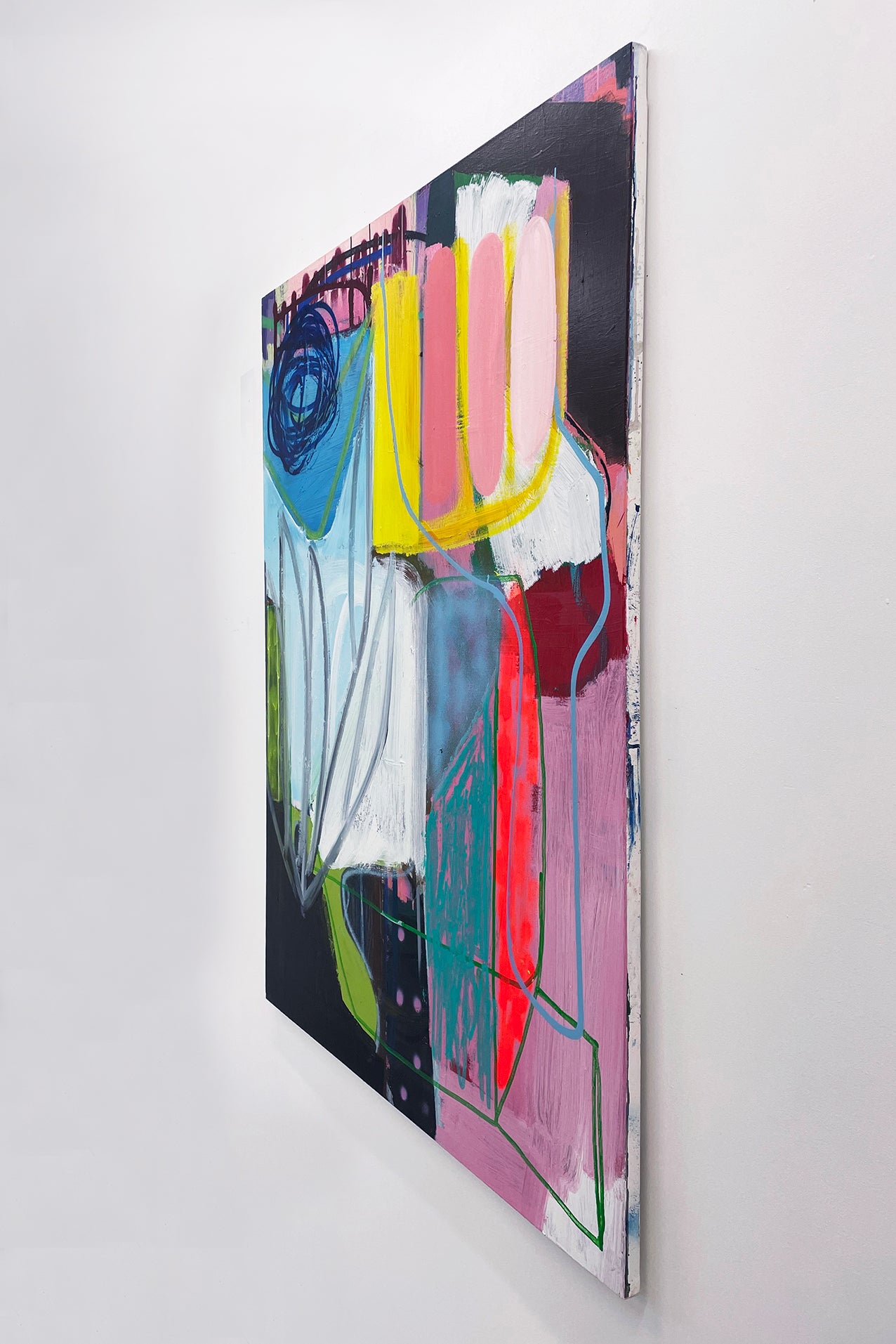 A painting on a white wall with a black background.