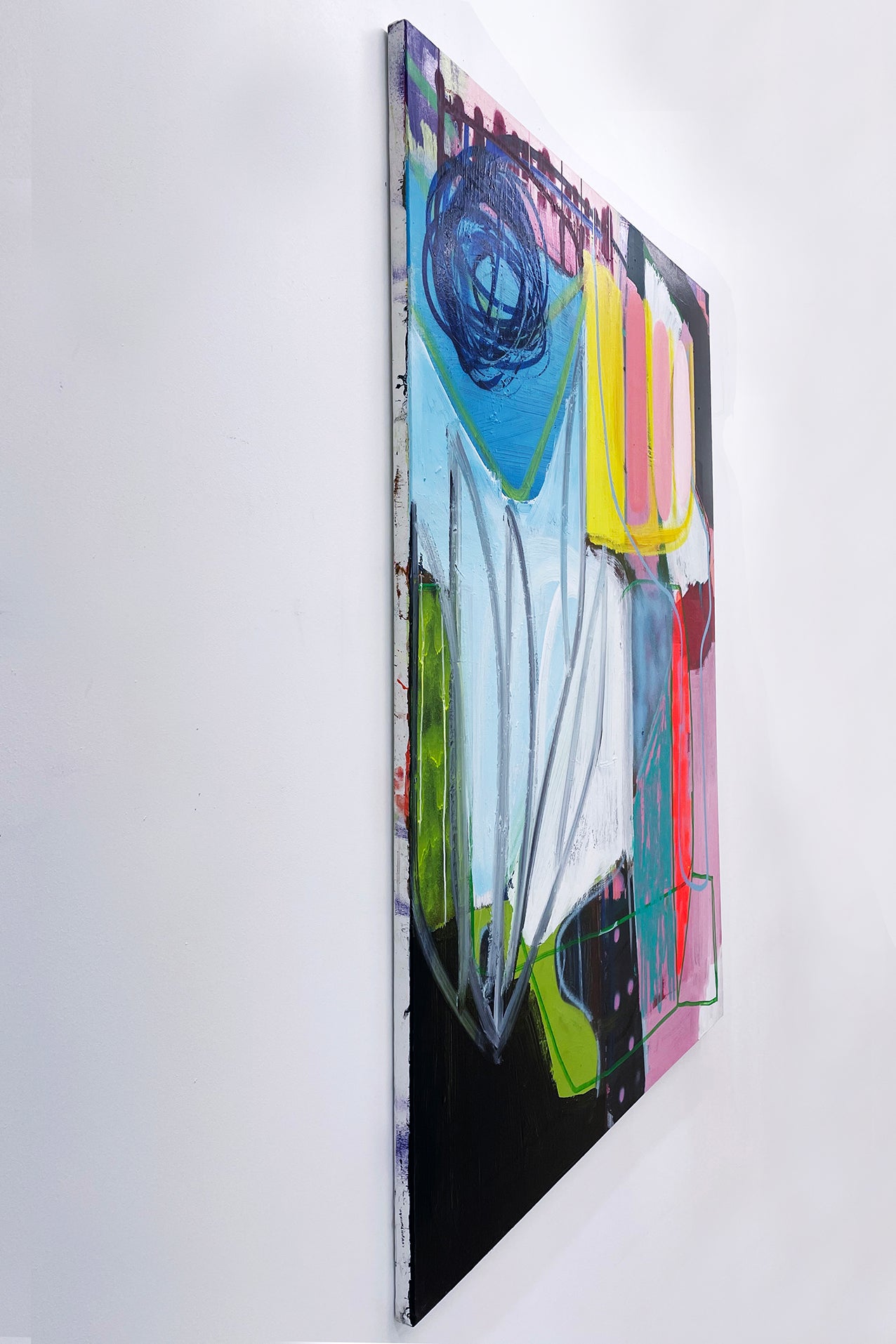 A painting on a white wall with a black background.
