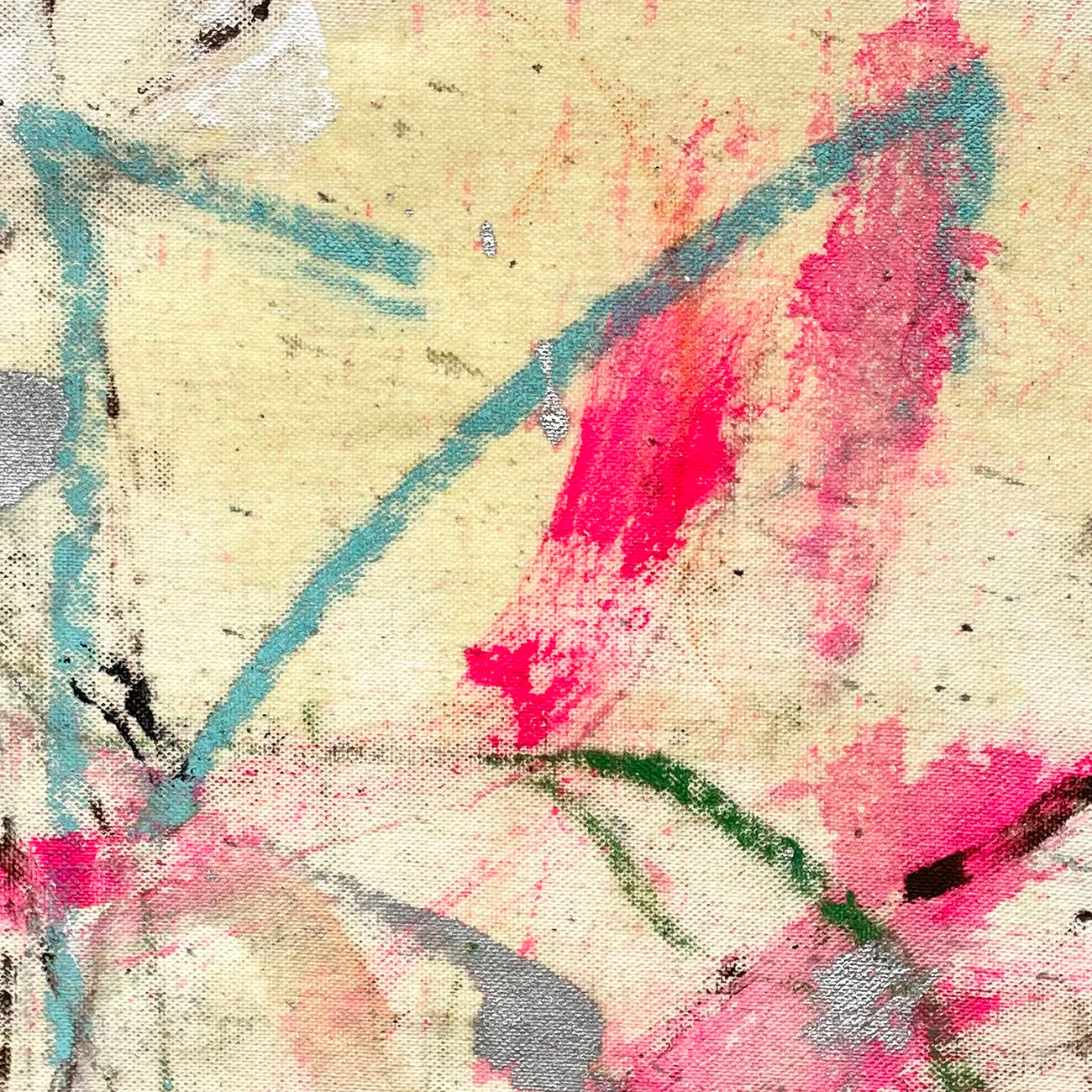 A painting of pink and blue paint splatters on a white background.