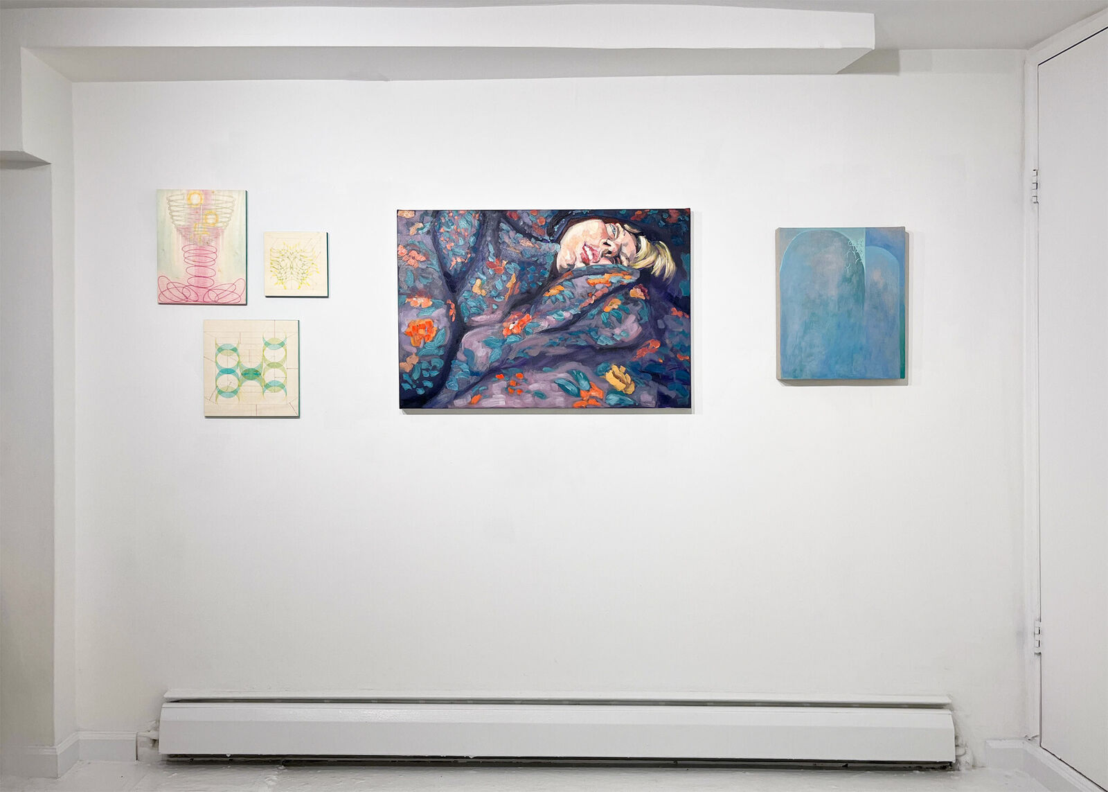 A vibrant painting of a person sleeping under a floral blanket.