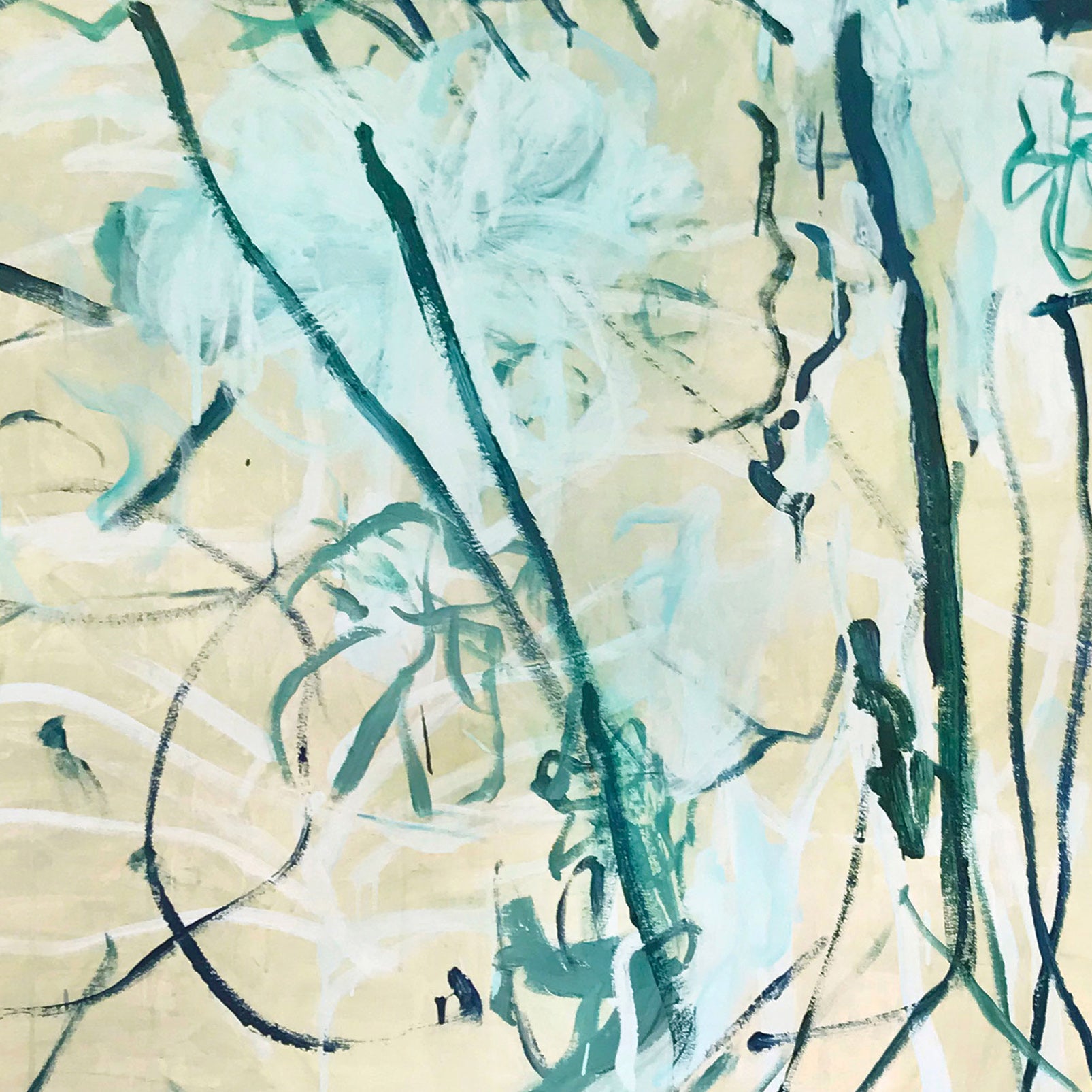 A painting with blue and green paint on a beige background.