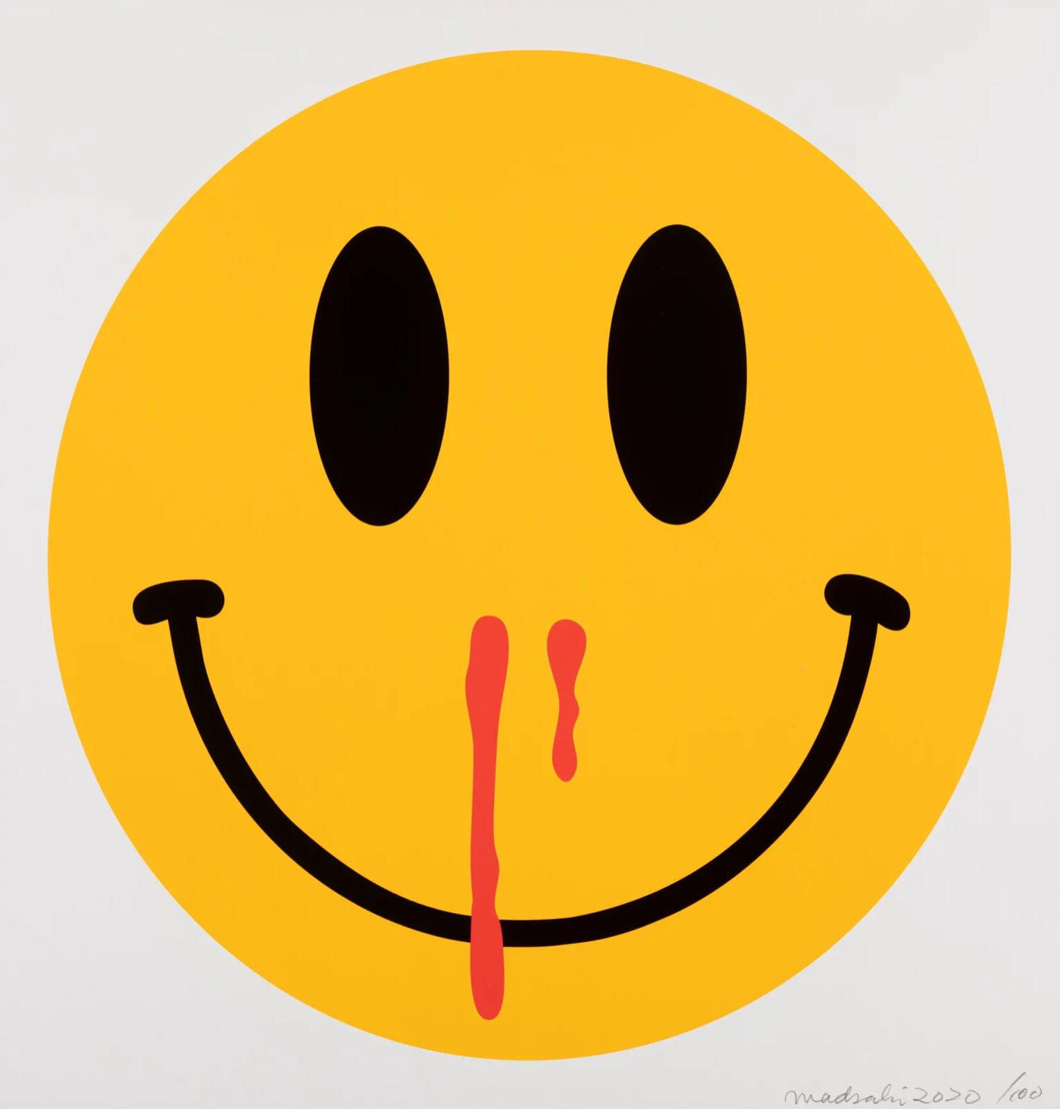 A yellow smiley face with a red tongue sticking out.