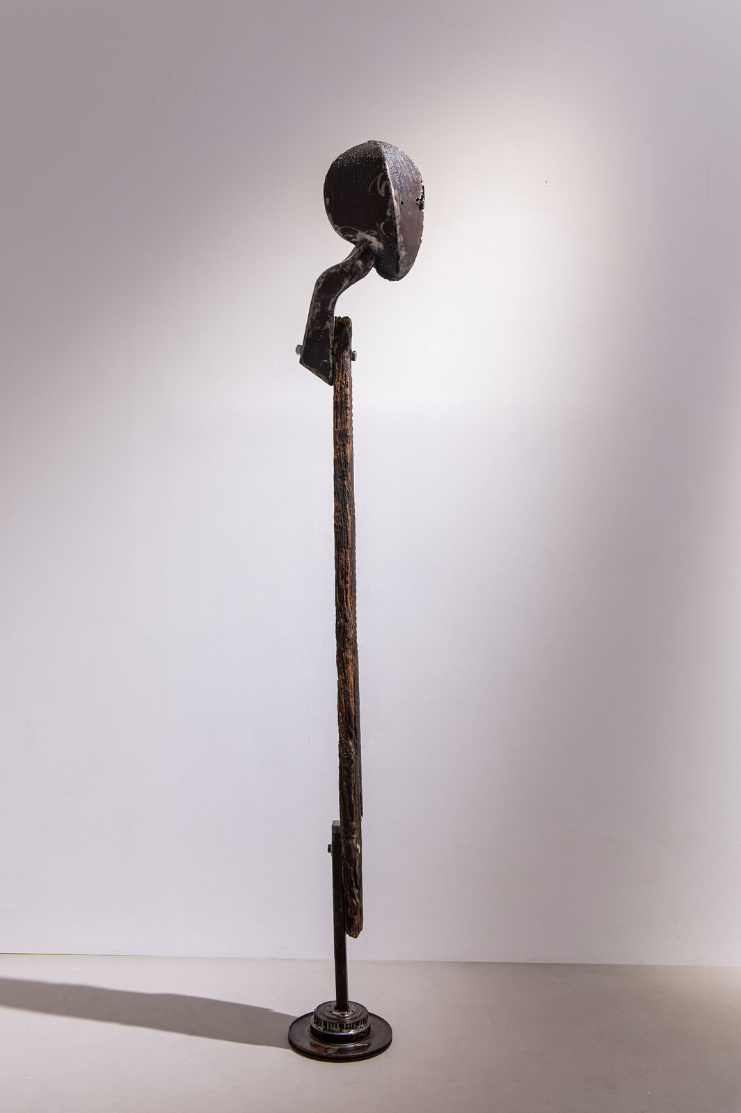 Artwork by Maggie Otieno, Fafanua Tena (Explain It Again), Made of Mild steel with railway sleepers 