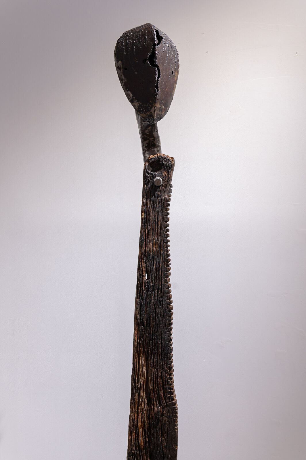 Artwork by Maggie Otieno, Fafanua Tena (Explain It Again), Made of Mild steel with railway sleepers 