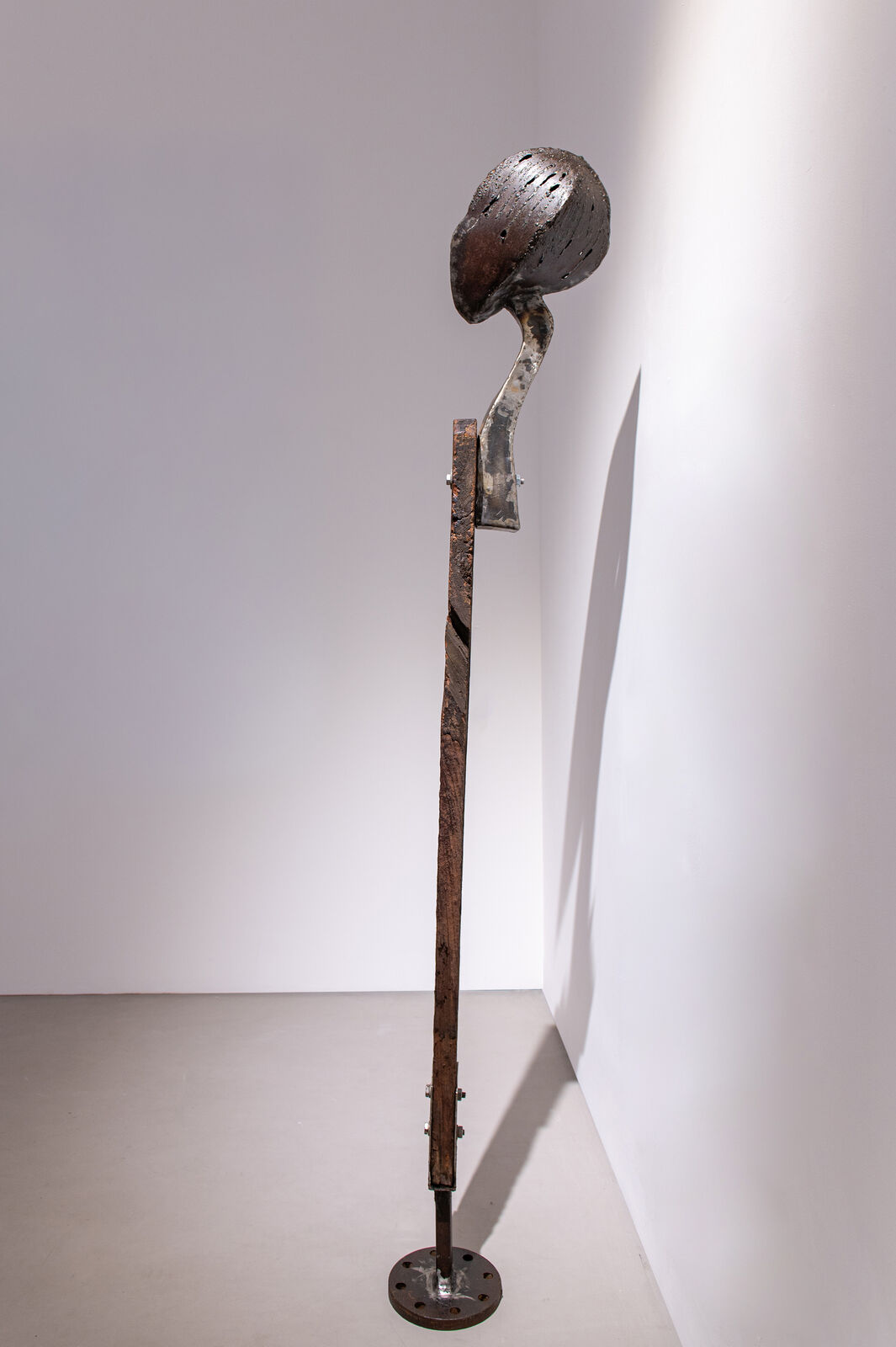 Artwork by Maggie Otieno, Ndio Mimi Sasa, Made of Mild steel with Red Teak 